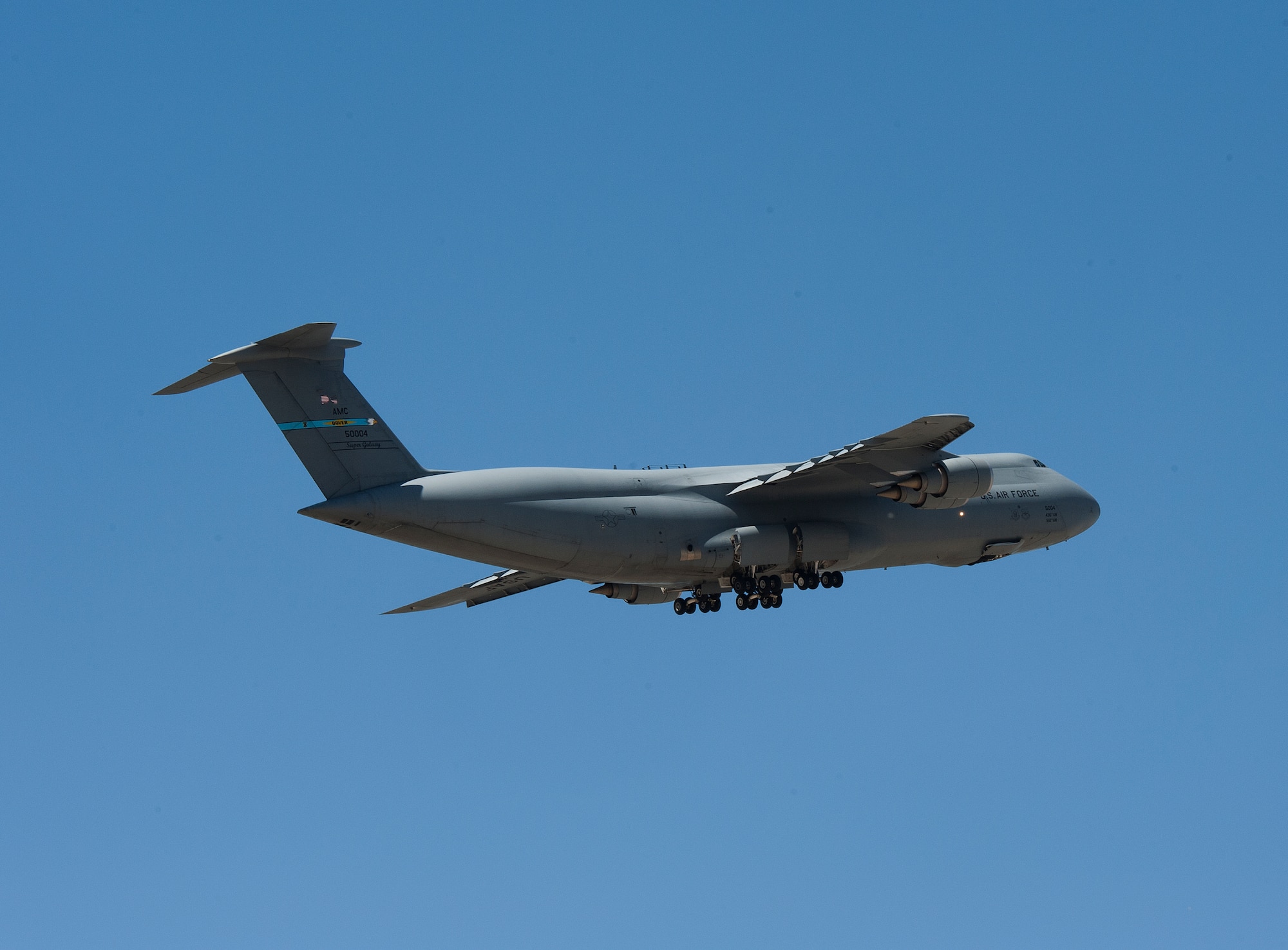 C-5M Super Galaxy takes off from the flight line after being loaded with cargo from the 391st Fighter Squadron May 27, 2014, at Mountain Home Air Force Base, Idaho. The cargo will support an upcoming deployment for 391st FS. (U.S. Air Force photo by Tech. Sgt. JT May III/RELEASED