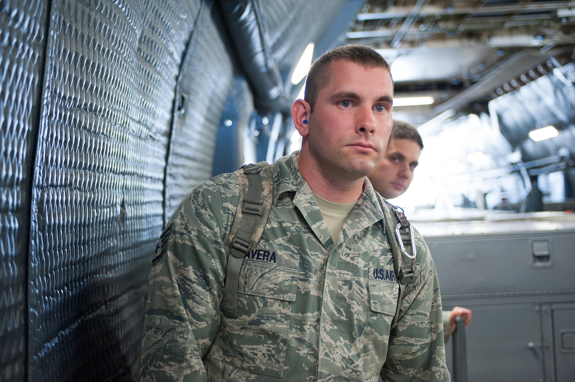 Staff Sgt. John Avera, 366th Component Maintenance Squadron team leader, and Senior Airman Robert Jones, 366th CMS team member, wait onboard a C-5M Super Galaxy May 27, 2014, at Mountain Home Air Force Base, Idaho. Both are supporting a 391st Fighter Squadron deployment to an undisclosed location. (U.S. Air Force photo by Tech. Sgt. JT May III/RELEASED