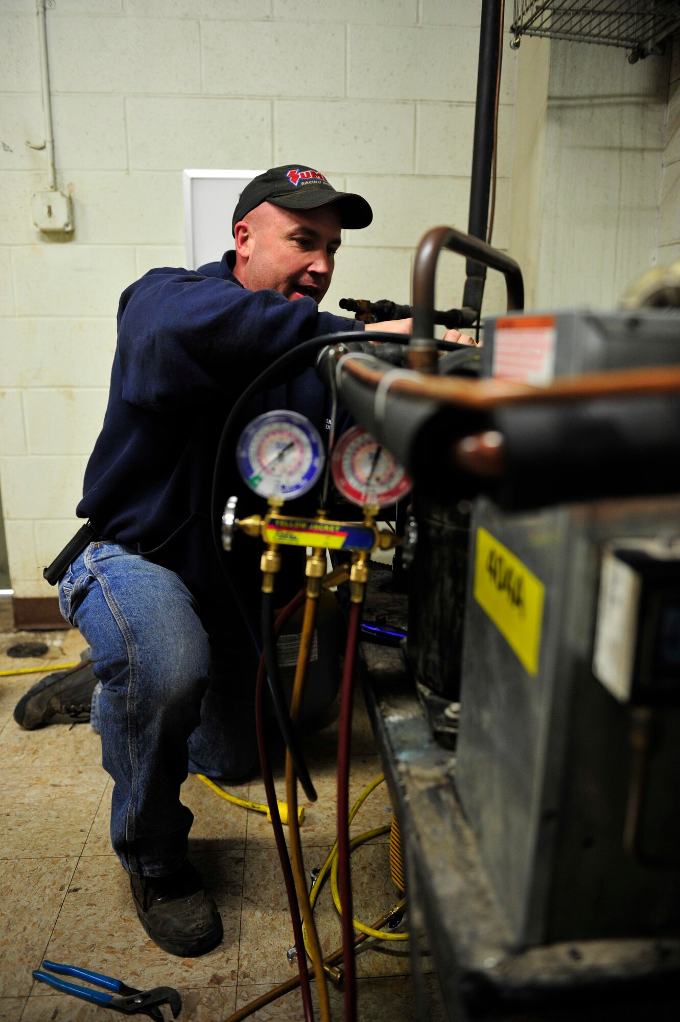 The Heating, Ventilation, Air Conditioning, and Refrigeration specialists of the 5th Civil Engineer Squadron are responsible for installing, maintaining and repairing furnaces, boilers, stoves, heat exchangers, burners, blowers, fans and radiant heaters.  Climate control plays a large role in the comfort of the Airmen at Minot Air Force Base. HVAC is also responsible for maintaining electric, electronic and pneumatic controls associated directly with the refrigeration/cooling equipment. (U.S. Air Force photos/Senior Airman Kristoffer Kaubisch)