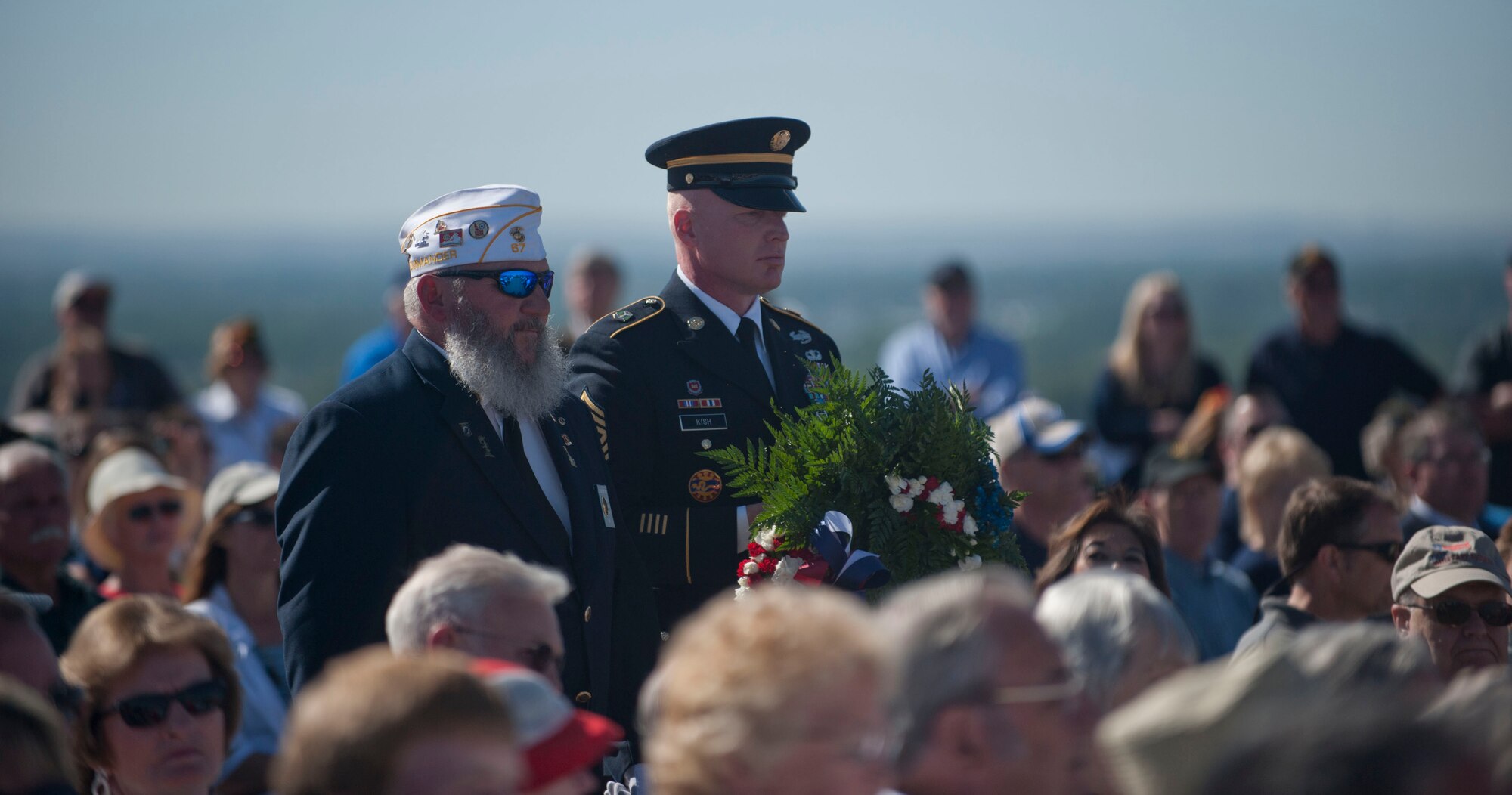 The Idaho Women Veteran’s Organization present a wreath during the Memorial Day ceremony in Boise, Idaho, May 26, 2014. During the ceremony, 21 organizations laid wreaths in honor of past and current veterans. (U.S. Air Force photo by Airman 1st Class Malissa Lott/RELEASED)