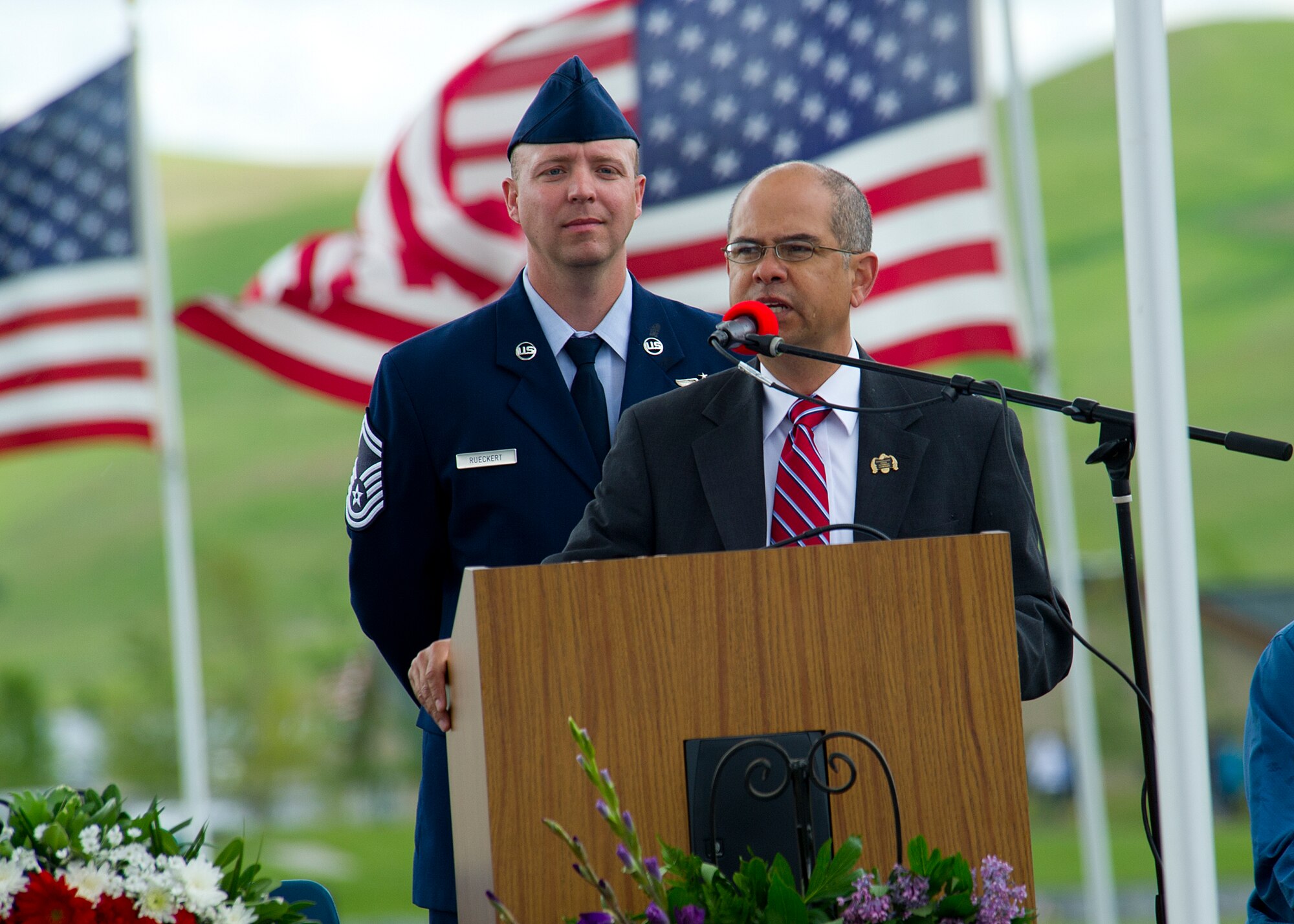 Rudy Lopez, Washington State Veterans Cemetery director, provides opening remarks during a Memorial Day celebration at Medical Lake, Wash., May 26, 2014. This year marked the 146th year since Memorial Day started following General Order No. 11 given by Commander in Chief General John A. Logan, Grand Army of the Republic. (U.S. Air Force photo by Staff Sgt. Michael Means/Released)