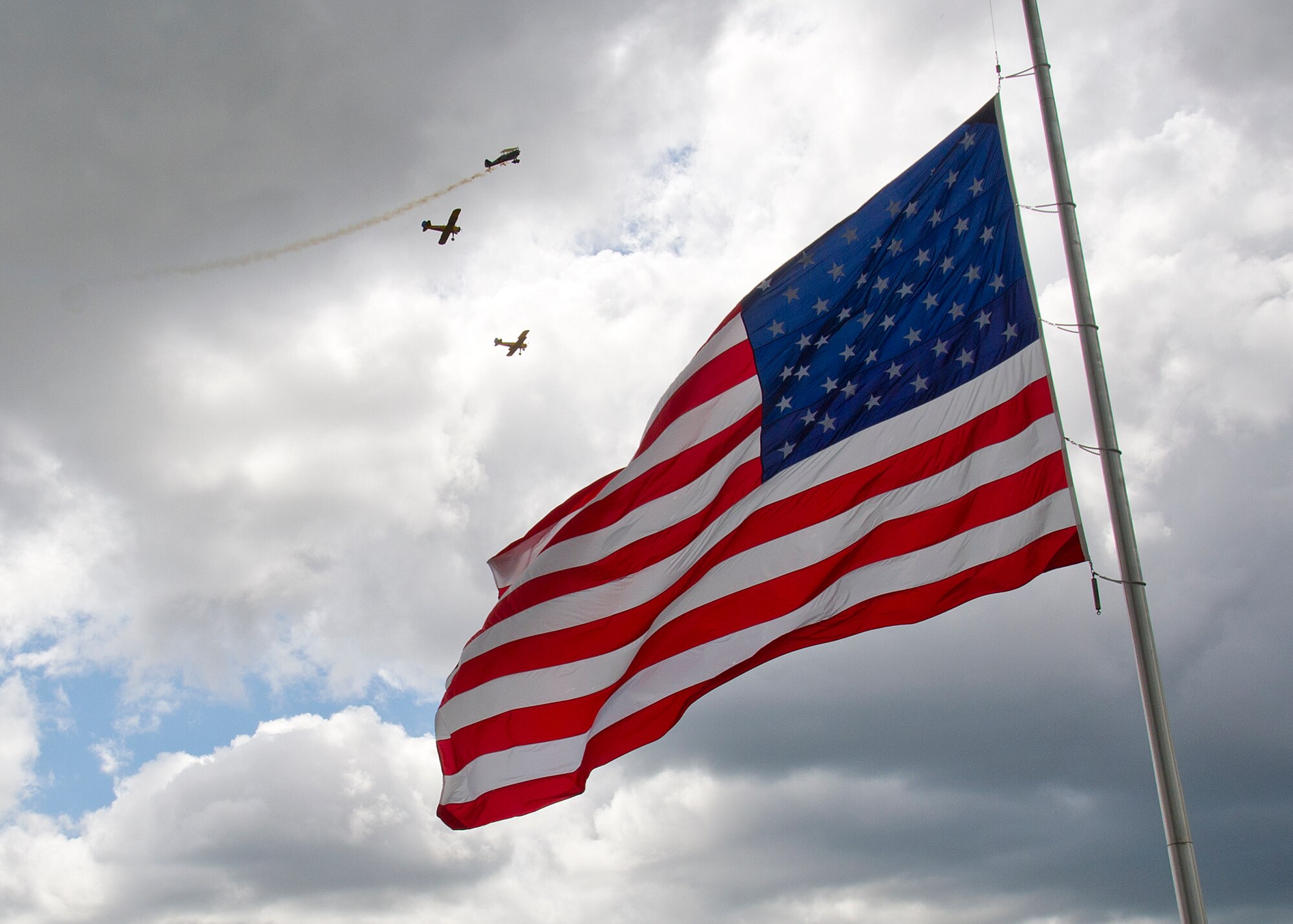 Steersmen perform a flyover during the Memorial Day ceremony at Medical Lake, Wash., May 26, 2014. Memorial Day recognizes men and women who have died while serving in the Armed Forces. The Washington State Veterans Cemetery services nearly 140,000 veterans and their families living in Eastern Washington. (U.S. Air Force photo by Staff Sgt. Michael Means/Released)