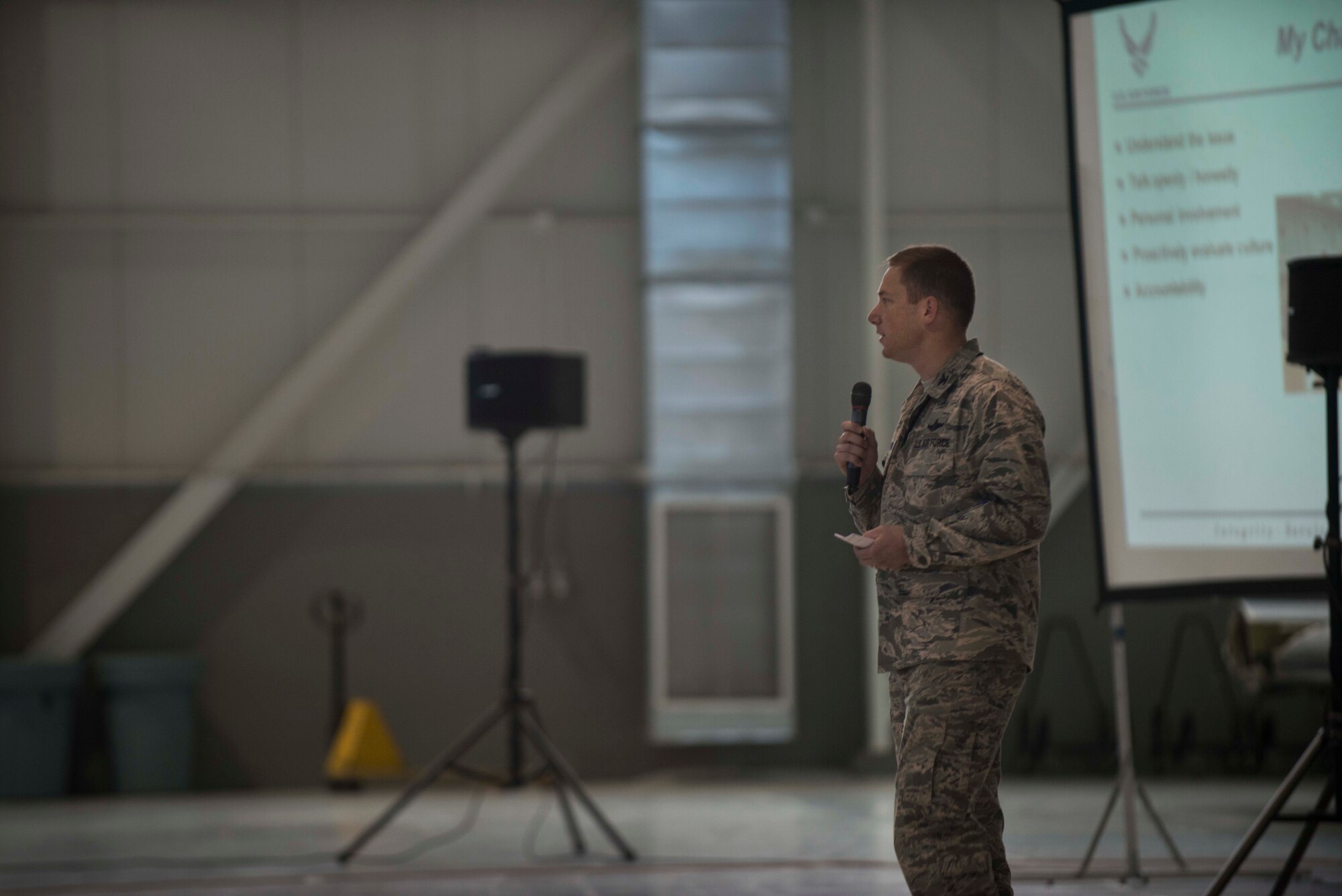 5th Bomb Wing commander Col. Alex Mezynski addresses Airmen during the Sexual Assault Prevention and Response Stand-Down Day all-call at Minot Air Force Base, N.D., May 22, 2014. The all-call, which was part one of the Air Force’s annual resiliency training, included ways to identify an offender and options for anyone affected by sexual assault. (U.S. Air Force photo/Airman 1st Class Lauren Pitts) 