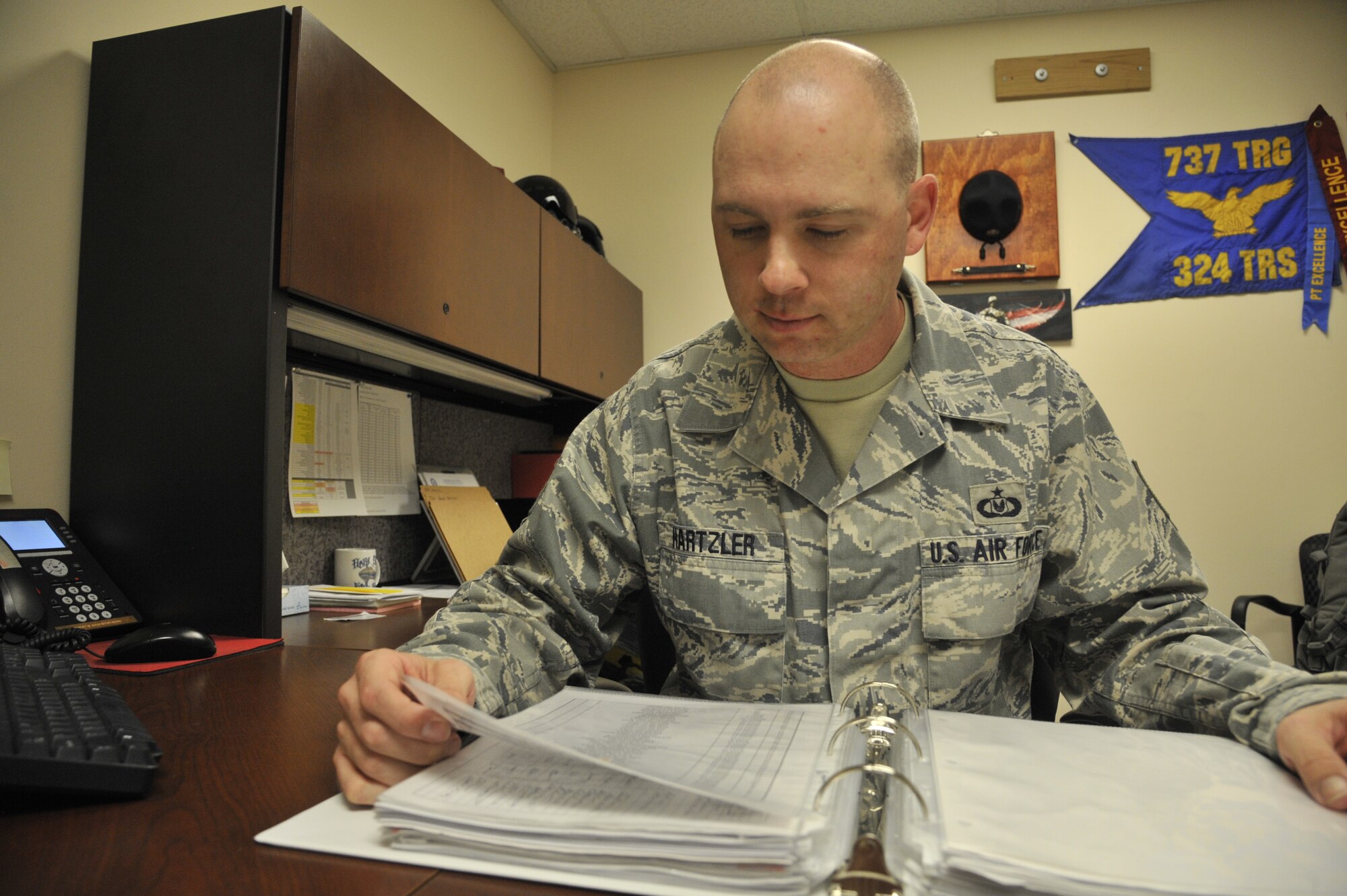 Tech. Sgt. Aaron Hartzler has been selected as a member of Team Fairchild's elite, Fairchild's Finest, at Fairchild Air Force Base, Wash. Hartzler is the NCO in-charge, aircrew flight equipment operations and hails from Portland, Ore. (U.S. Air Force photo by Senior Airman Mary O'Dell/Released)