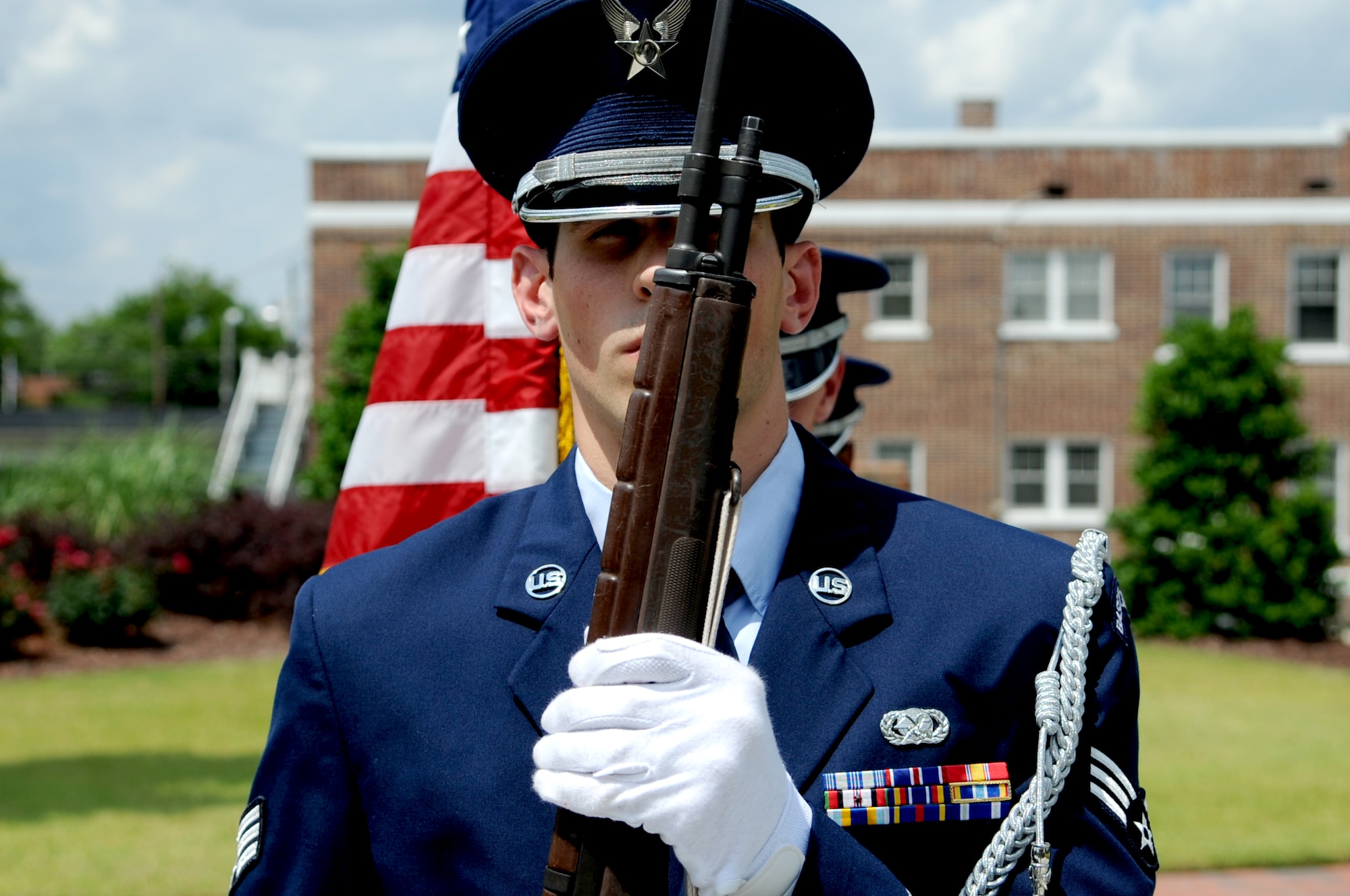 Senior Airman Noah Lazurka, 4th Fighter Wing honor guardsman, assumes the position of port arms, May 26, 2014, at the National Moment of Silence event at the Wayne County Veteran’s Memorial in Goldsboro, North Carolina. The event was held in honor of those who died in service to the nation. (U.S. Air Force photo/Senior Airman Mariah Tolbert)