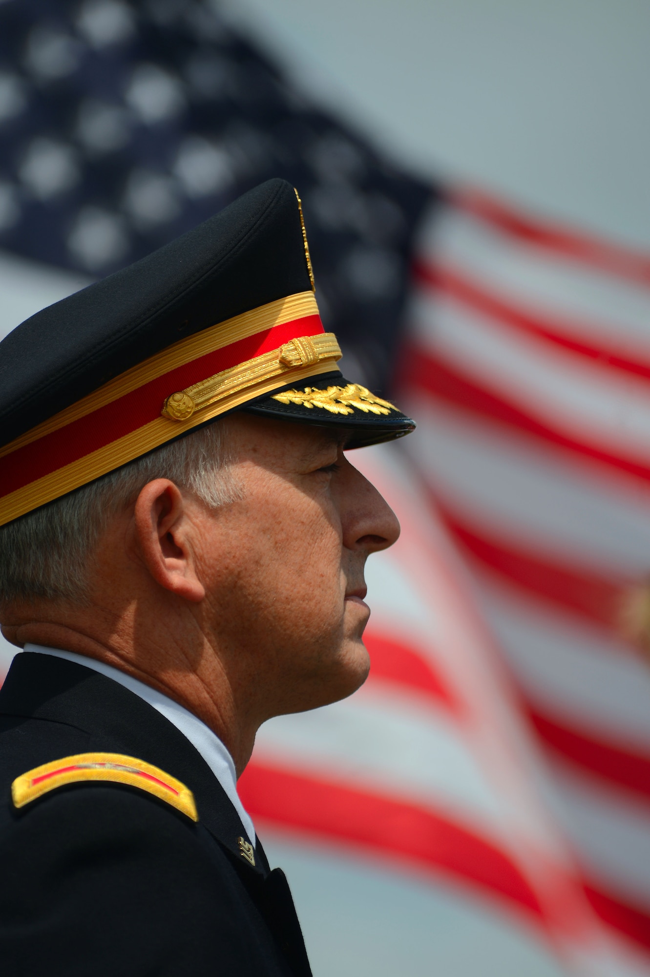 U.S. Army Col. Wellons watches a Memorial Day ceremony at Buford Mabry Park in Sumter S.C., May 26, 2014 represent the fallen men and women of the armed services. Approximately 150 people attended a Memorial Day ceremony to honor those who lost their lives in the line of duty. (U.S. Air Force photo by Airman 1st Class Jensen Stidham/released)