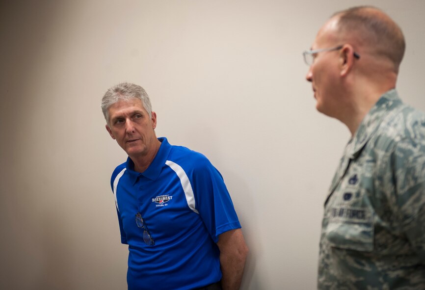 Rick Walker, Pepsi supply chain operations supervisor, talks to U.S. Air Force Col. Jeffrey W. Decker, 23d Maintenance Group commander, during a base visit at Moody Air Force Base, Ga., May 20, 2014. Moody Airmen previously visited a Pepsi facility as part of an ongoing effort between the two organizations to innovate and broaden logistics processes. (U.S. Air Force photo by Senior Airman Jarrod Grammel/Released)
