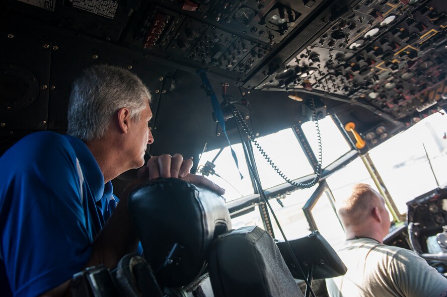 Rick Walker, Pepsi Co. Inc. supply chain operations supervisor, looks at the inside of an HC-130J Combat King II at Moody Air Force Base, Ga., May 20, 2014. The goal of the visit for Pepsi employees and Moody was to compare logistics processes and encourage innovation. (U.S. Air Force photo by Senior Airman Jarrod Grammel/Released)
