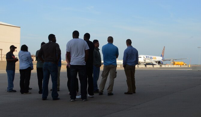 Members of the 301st, 307th, and 610th Security Forces squadrons wait to board a jet at Naval Air Station Fort Worth Joint Reserve Base, Texas, May 20, 2014. They are deploying to Jordan in support of the annual excercise Eager Lion, which includes more than 12,500 military and civilian participants from five continents, according to U.S. Central Command, and focuses on strengthening the military-to-military relationships and further demonstrates the U.S. commitment to regional security and stability. (U.S. Air Force photo by Staff Sgt. Samantha Mathison)