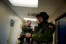 Staff Sgts. Daniel Vehslage and Jake Gornbein, 54th Helicopter Squadron special missions aviator instructor, prepares for take-off at Minot Air Force Base, N.D., May 13, 2014. Special mission aviation, a fairly new career field, was split off from flight engineers to create specialized Airmen (U.S. Air Force photo/Senior Airman Brittany Y. Bateman)