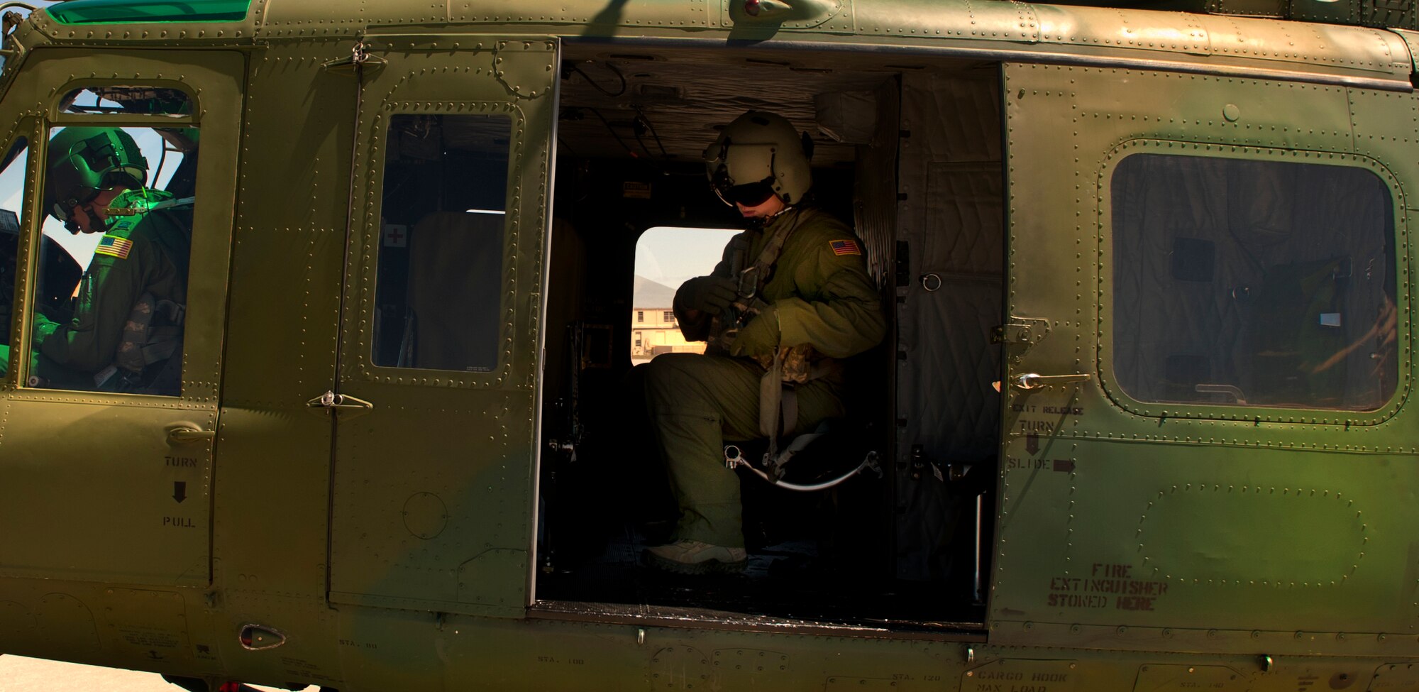 Staff Sgt. Jake Gornbein, 54th Helicopter Squadron special missions aviator instructor, prepares for take-off at Minot Air Force Base, N.D., May 13, 2014. SMAs mission at Minot AFB is 24/7 Nuclear Security for not only the 791st Missile Security Forces Squadron convoys section but the missile field as well. (U.S. Air Force photo/Senior Airman Brittany Y. Bateman)