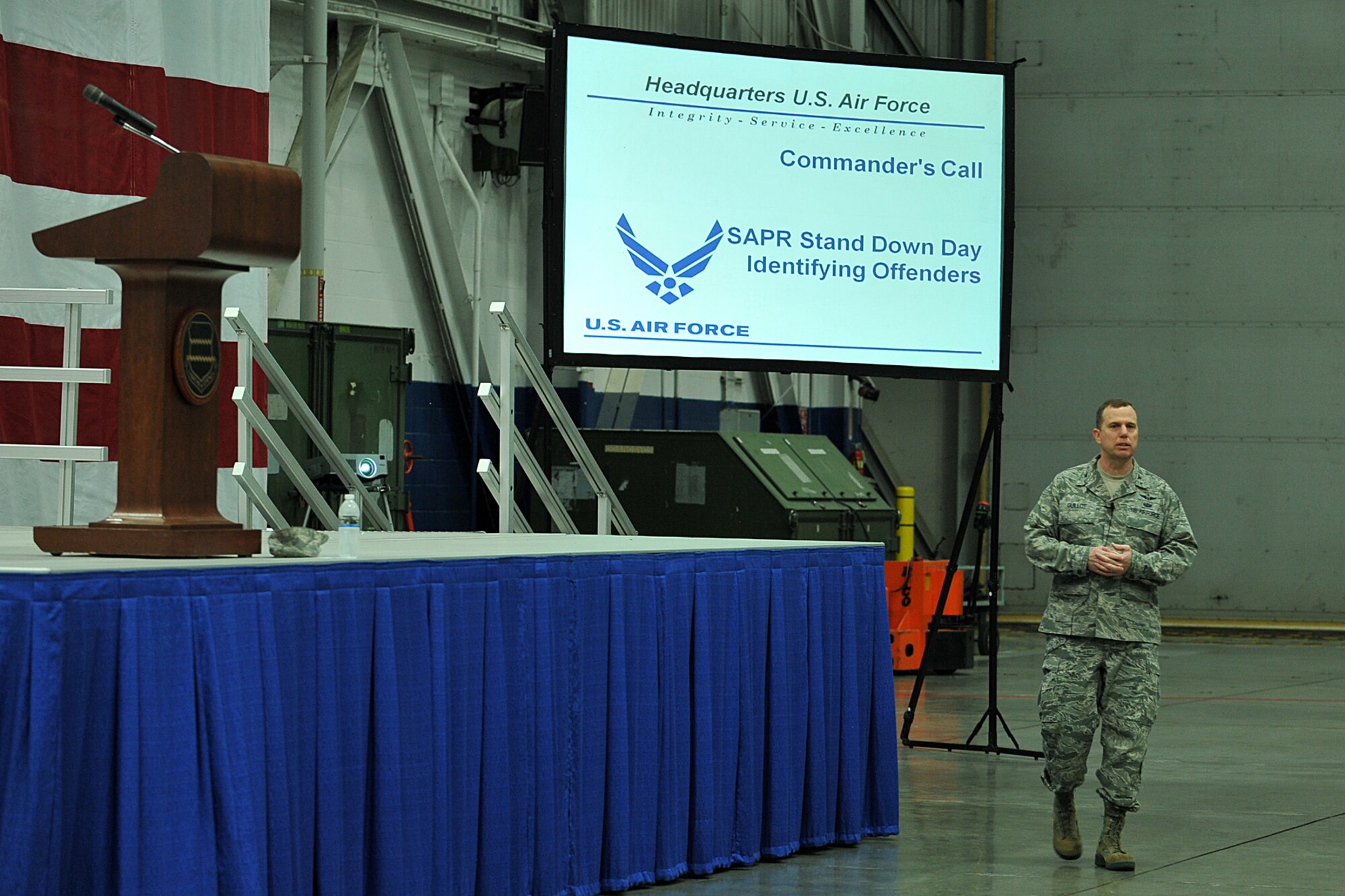 U.S. Air Force Col. Gregory Guillot, 55th Wing commander, speaks to members of the 55th Wing during a Comprehensive Airman Fitness Day commander’s call held in Dock 1 of the Bennie Davis Maintenance Facility on Offutt Air Force Base, Neb., May 22. Col. Guillot provided the wing with important information regarding sexual assault prevention and response.