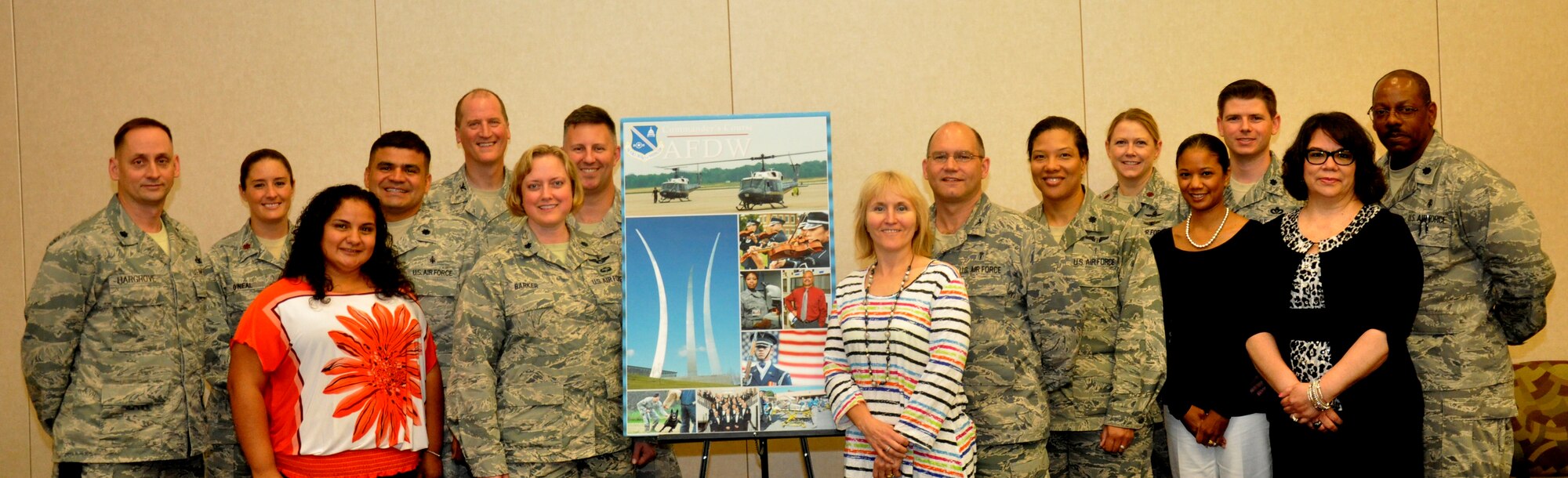 Future Air Force District of Washington commanders and their spouses pose for a photo after completing the Direct Reporting Unit's annual Commander's Course to enhance their knowledge of the command's mission and hone their leadership skills here May 20-23. Some of the course participants have prior command experience and others don't; their new units of command range from the 11th Security Forces Support Squadron to the AFDW Special Staff Section. During the course the commanders received the latest force management update, learned about the total force mission in the National Capital Region, heard about the resiliency resources and more. (Courtesy photo)