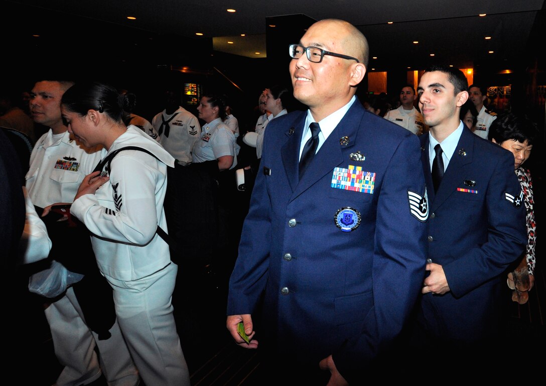 Tech Sgt. Andrew Davis, 514th Air Mobility Wing line recruiter and Airman 1st Class Anthony Vinci, 514th Force Support Squadron member, wait to be escorted into “The Tonight Show” studio at Rockefeller Center in New York City May 23. In recognition of Military Appreciation Month, 45 servicemembers from each branch of service were invited to attend a taping of the show (U.S. Air Force photo/Senior Airman Chelsea Smith).