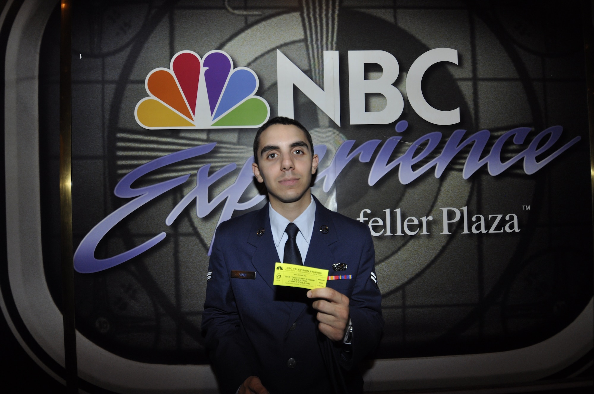 Airman 1st Class Anthony Vinci of the 514th Force Support Squadron displays his “The Tonight Show” ticket at Rockefeller Center in New York City prior to the taping May 23. Vinci was one of ten members selected from the Freedom Wing to attend a taping of the show honoring Military Appreciation Month (U.S. Air Force photo/Senior Airman Chelsea Smith).