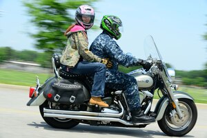 Service members, civilians, and retirees participated in a Wounded Veteran Motorcycle Safety Ride at Fort Eustis, Va., May 21, 2014. Before the cyclists departed they received a safety check and briefing. (U.S. Air Force photo by Airman 1st Class Kimberly Nagle/Released)