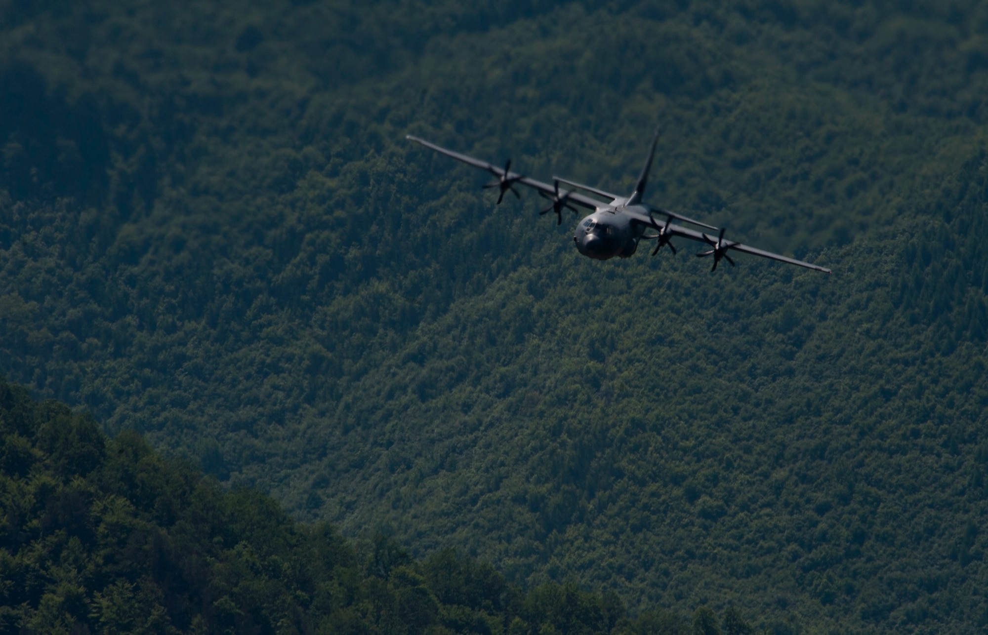 A C-130J Super Hercules assigned to the 37th Airlift Squadron flies above Romania during Carpathian Spring 2014, May 21, 2014. The two-week-long exercise allowed C-130J aircrew to fly in less-restrictive airspace, which let them utilize night-vision capabilities and fly in low-level formations. It also gave Romanian and U.S. Air Force pilots the opportunity to learn each other’s procedures, as they perform a variety of missions. (U.S. Air Force photo/Senior Airman Damon Kasberg)