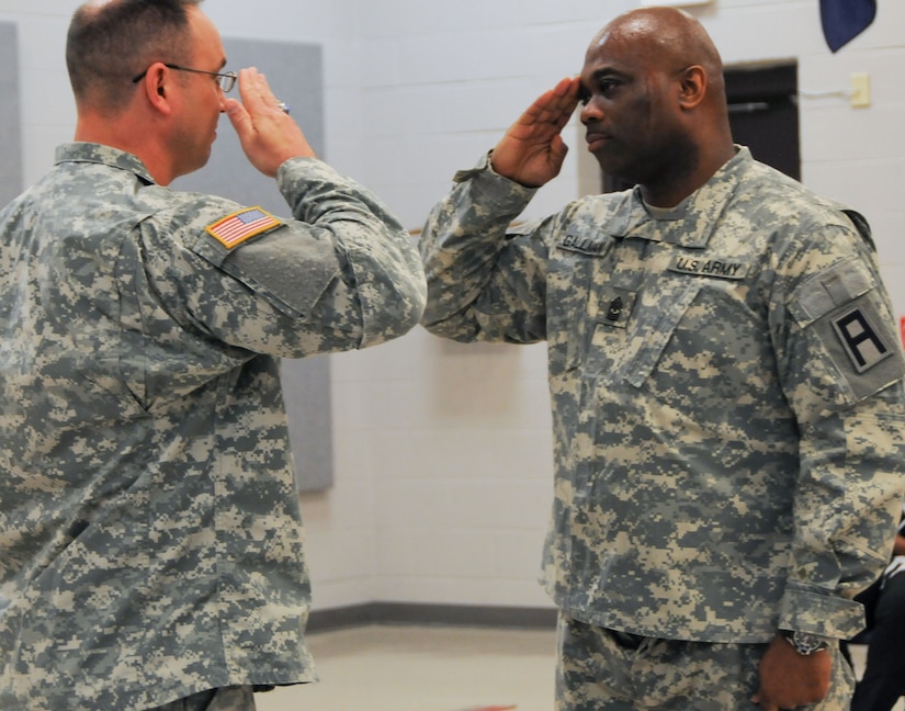 Sgt. Maj. David Gallman, sergeant major of the Army Reserve’s 72nd Field Artillery Brigade, right, salutes Maj. Trey Hayes, commander of the Army Reserve’s Headquarters and Headquarters Company, 99th Regional Support Command, during the former’s promotion ceremony May 17 at 99th RSC headquarters on Joint Base McGuire-Dix-Lakehurst, N.J. Gallman previously served as the first sergeant for the 99th RSC HHC. (U.S. Army photo by Staff Sgt. Shawn Morris/Released)