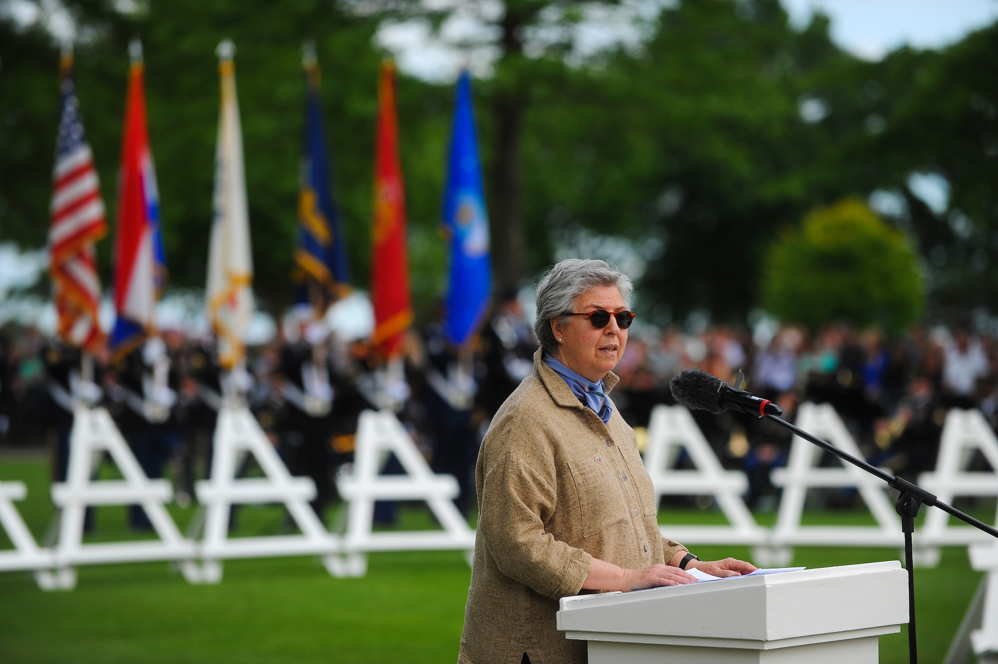 Anne Roosevelt, granddaughter of former U.S. President Franklin Roosevelt and board chair for the Roosevelt Institute, speaks during a Memorial Day ceremony at the Netherlands American Cemetery May 25, 2014, Margraten, Netherlands. Roosevelt was one of the many guest speakers at the ceremony. (U.S. Air Force photo by Senior Airman Rusty Frank/Released)