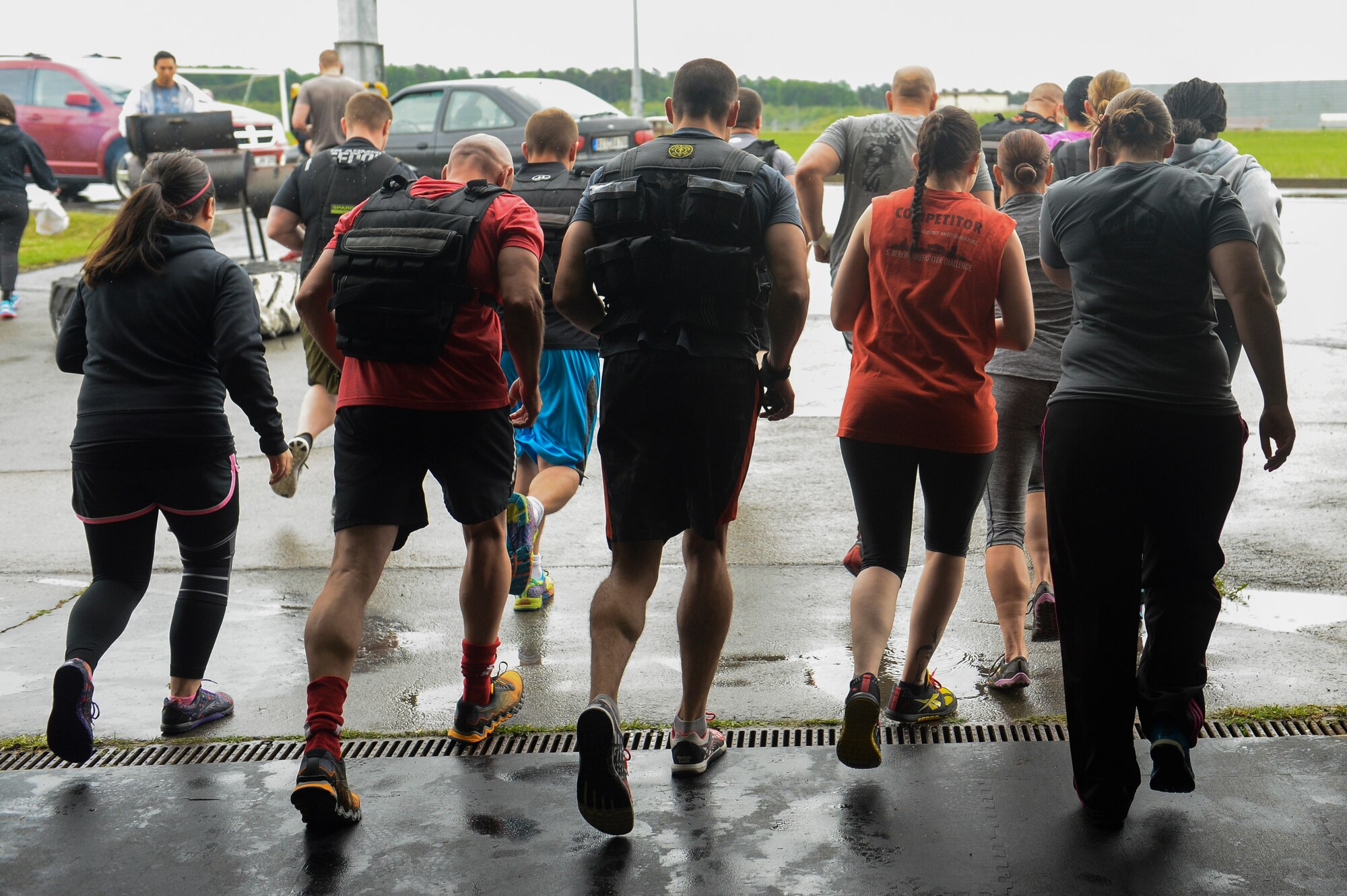 Spangdahlem Airmen run during a "Murph" workout during a "Murph" Challenge May 23, 2014, at Spangdahlem Air Base, Germany. The "Murph" workout is a combat fitness workout named in memory of Medal Honor Recipient U.S. Navy Lt. Michael Murphy's favorite workout. (U.S. Air Force photo by Senior Airman Rusty Frank/Released)