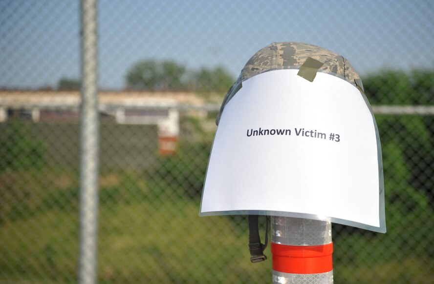 A helmet represents one of the base’s reported sexual assault cases during Fiscal Year 2013 at Osan Air Base, Republic of Korea, May 22, 2014. The victim represented was one of the few out of the 20 victims who made a restricted report which is why there is so little information about the case. (U.S. Air Force photo/Airman 1st Class Ashley J. Thum)