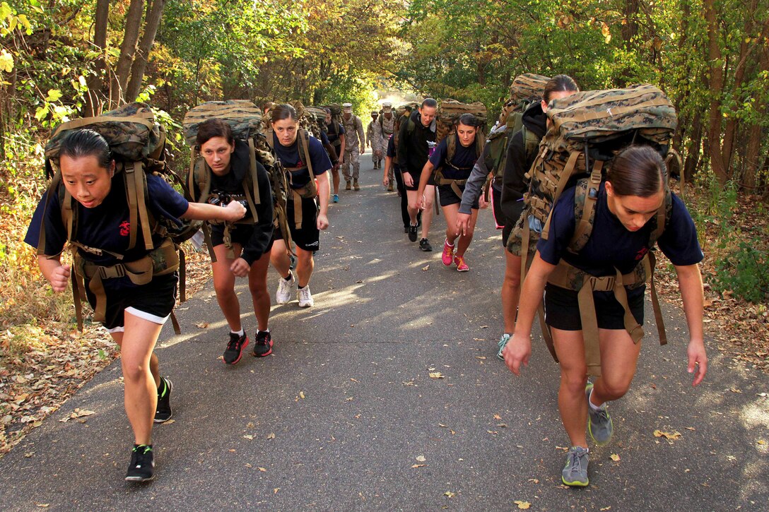 Twenty-eight aspiring Marines surge up a hill during a five-mile hike on Marine Corps Recruiting Station Twin Cities, Minn., Sept. 30, 2012.  
