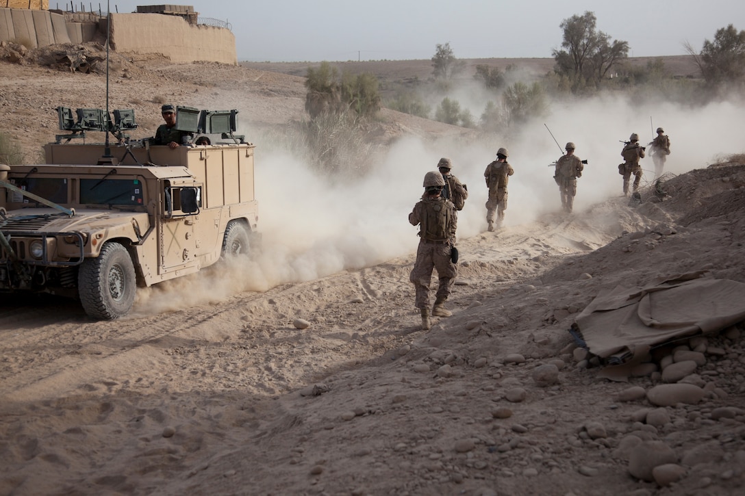 U.S. Marines begin a patrol near Forward Operating Base Shamsher in the Sangin district of Afghanistan's Helmand province, Sept. 6, 2012. The Marines are assigned to Bravo Company, 1st Battalion, 7th Marine Regiment, Regimental Combat Team 6.  
