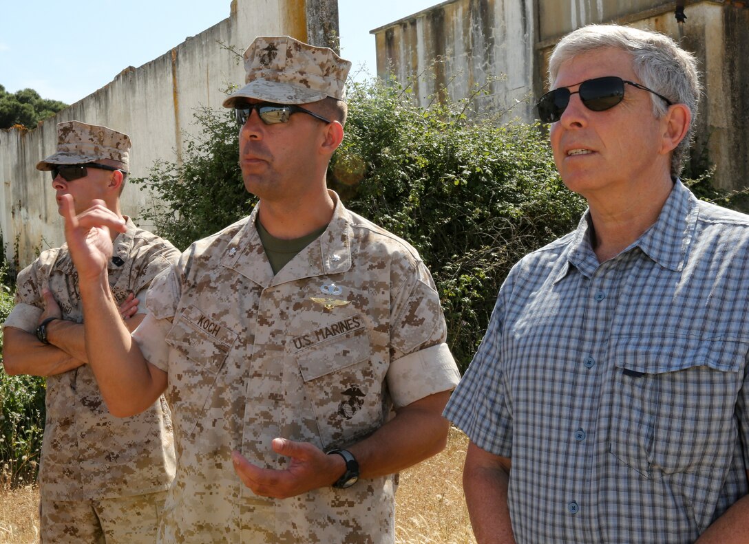 U.S. ambassador to Portugal, Ambassador Robert Sherman discusses the capabilities of the MV-22B tiltrotor Osprey with U.S. Marine Corps Lt. Col. Brian Koch, the commanding officer of the aviation combat element for Special-Purpose Marine Air-Ground Task Force Crisis Response, during bilateral training in collaboration with the Portuguese Marines aboard Lisbon Naval Base, Portugal, May 15, 2014. The training allowed the partners to improve cooperation and facilitate future engagements. 