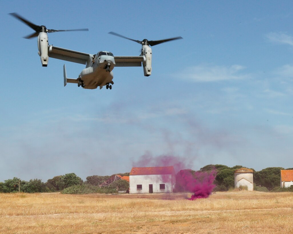 An MV-22B, tiltrotor, lands in Lisbon Naval Base, Portugal, for a bilateral training exercise with Portuguese Marines and the U.S. Marines of Special-Purpose Marine Air-Ground Task Force Crisis Response, May 15, 2014. The training allowed the Portuguese Marines to make use of the capabilities of the MV-22B, tiltrotor, Osprey. 