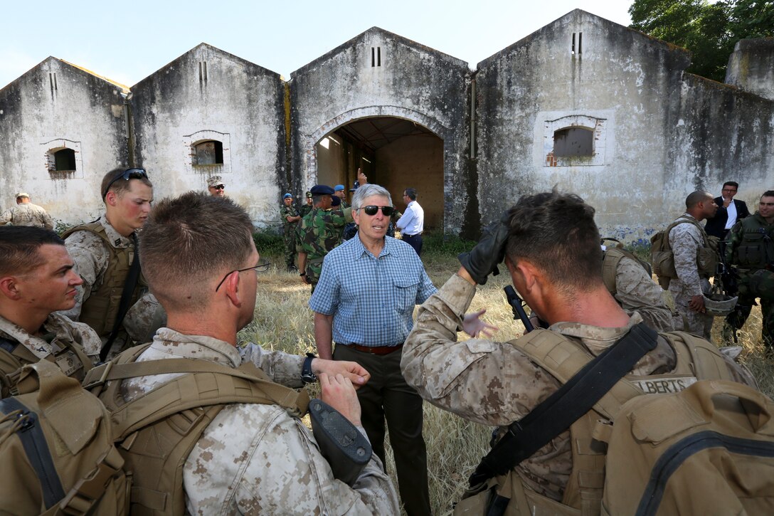 U.S. ambassador to Portugal, Ambassador Robert Sherman speaks with U.S. Marines of Special-Purpose Marine Air-Ground Task Force Crisis Response during bilateral training in collaboration with the Portuguese Marines aboard Lisbon Naval Base, Portugal, May 15, 2014. The training allowed the partners to improve cooperation and facilitate future engagements 
