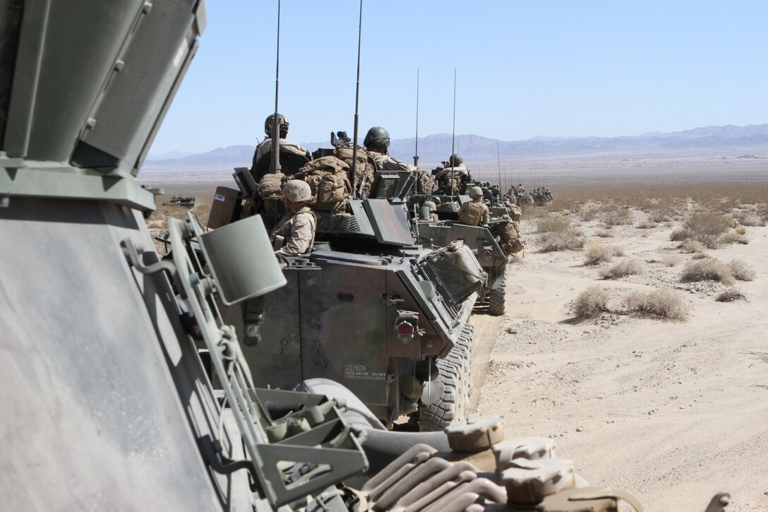 Marines with Delta Company, 1st Light Armored Reconnaissance Battalion, patrol in their light armored vehicles during Exercise Desert Scimitar aboard Marine Corps Air Ground Combat Center Twentynine Palms, Calif., May 13, 2014. Desert Scimitar is a large-scale exercise involving air, ground and logistical elements from I Marine Expeditionary Force.