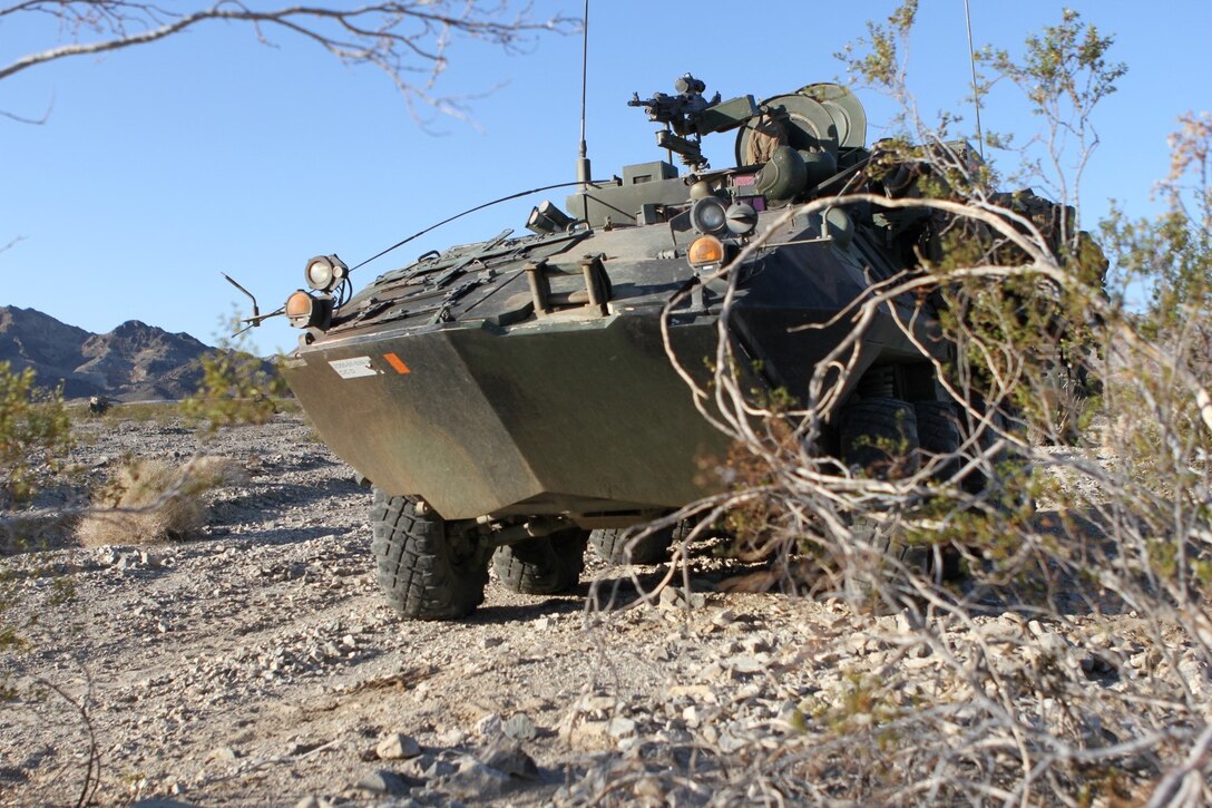 Marines with Delta Company, 1st Light Armored Reconnaissance Battalion, patrol in their light armored vehicles during Exercise Desert Scimitar aboard Marine Corps Air Ground Combat Center Twentynine Palms, Calif., May 15, 2014. Desert Scimitar is a large-scale exercise involving air, ground and logistical elements from I Marine Expeditionary Force.