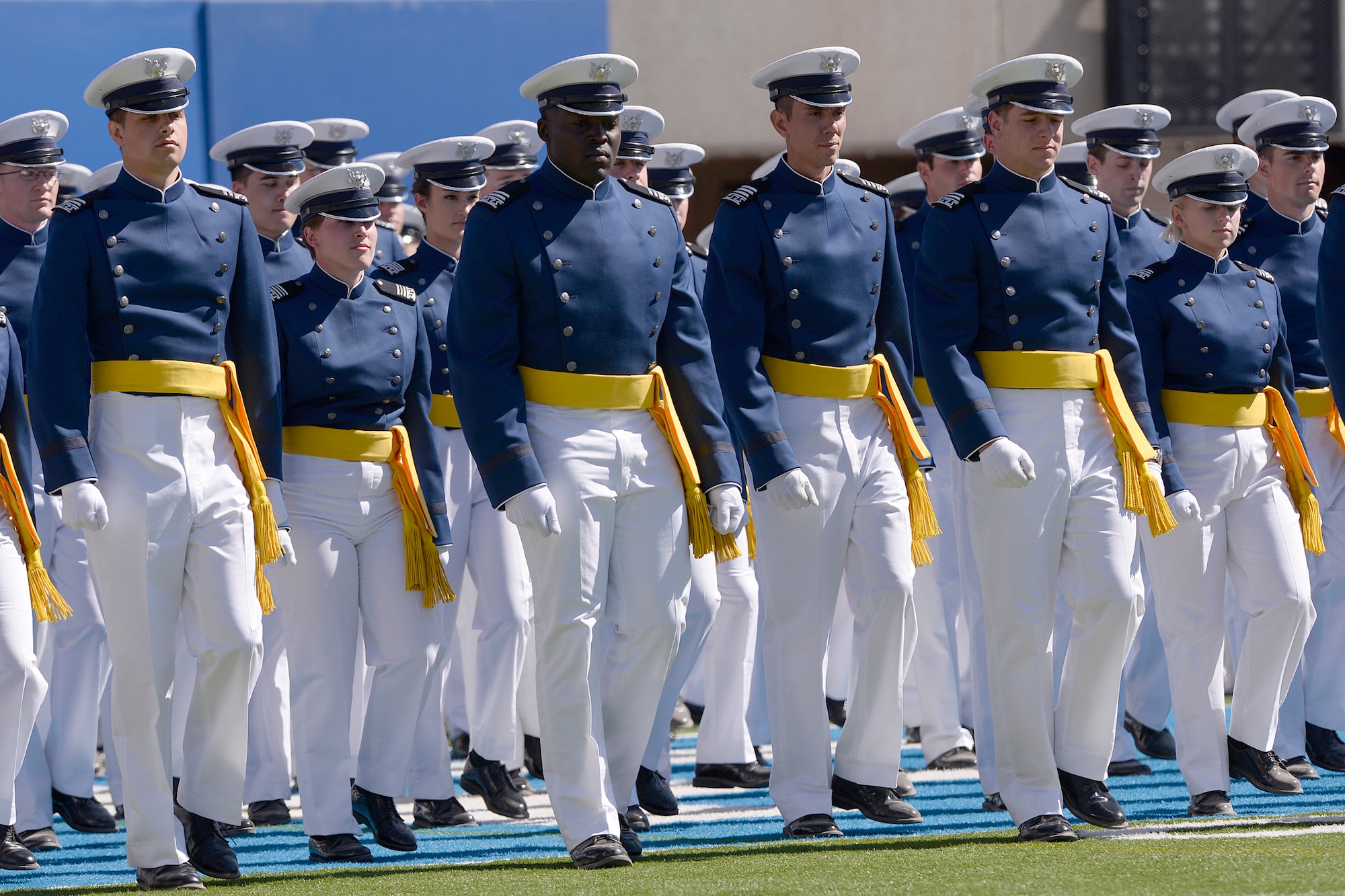 The U.S. Air Force Academy Class of 2014 marches into Falcon Stadium during the commencement ceremony May 28, 2014, in Colorado Springs, Colo. A total of 995 cadets received their commissions and Vice President Joseph R. Biden delivered the commencement address. (U.S. Air Force photo/Mike Kaplan) 