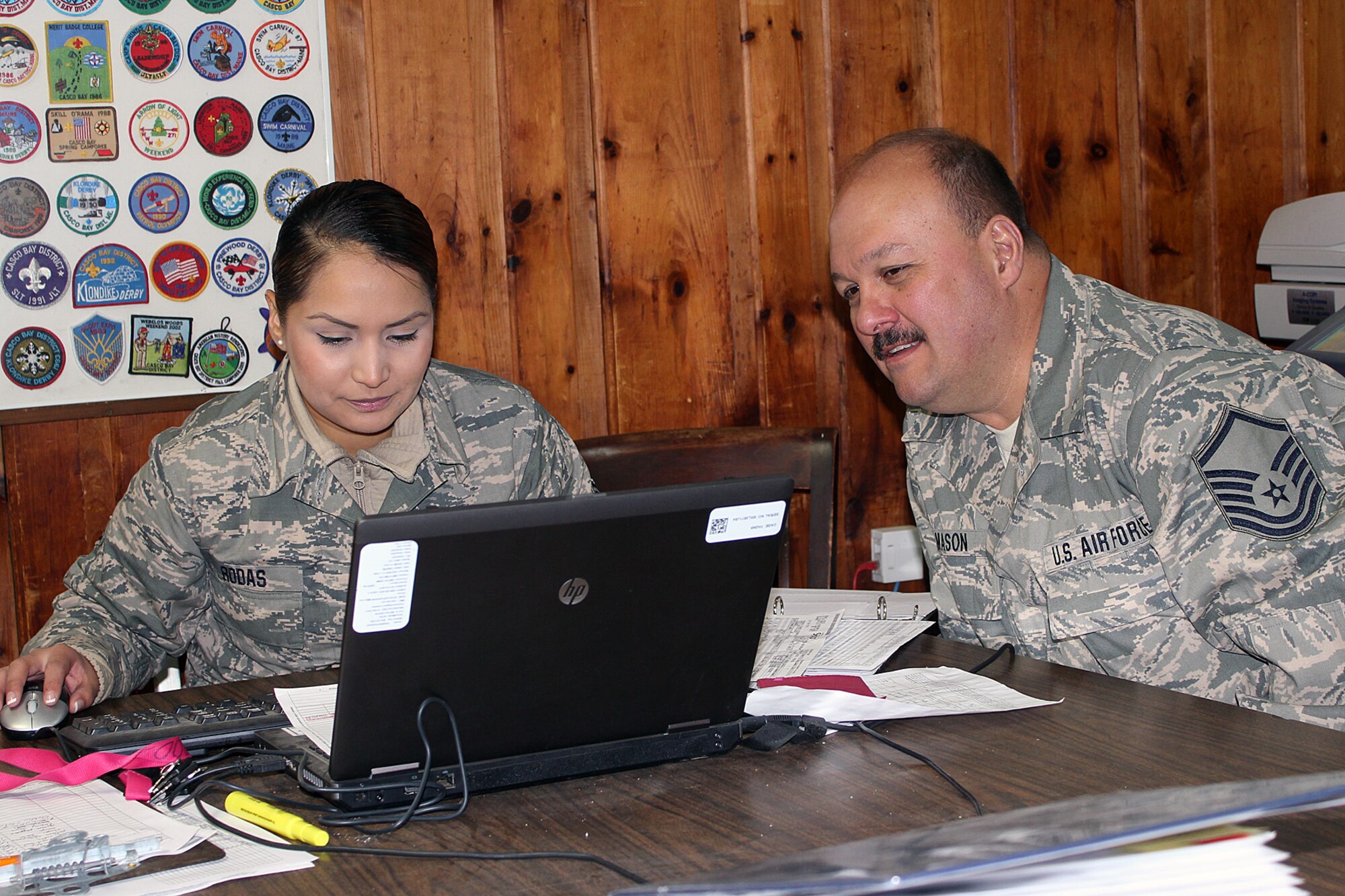 140528-Z-VA676-064  Senior Airman Audry Rodas and Master Sgt. Benjamin Mason work together to order food supplies for military personnel while at Camp Hinds Boy Scout camp, Raymond, Maine, May 28, 2014. The Airmen are part of an Innovative Readiness Training mission at the camp, which allows military personnel to get training in various tasks and a community organization, in this case the Boy Scouts, to benefit from the work. Air National Guard, Marine and Army Reserve units from about a dozen different states will be working on a construction project at the camp during summer 2014. Rodas is a member of the 143rd Force Support Squadron, Rhode Island Air National Guard. Mason is with the 127th FSS, Michigan ANG. The two units are working together to prepare and serve meals for military personnel working at the camp. (U.S. Air National Guard photo by Technical Sgt. Dan Heaton)