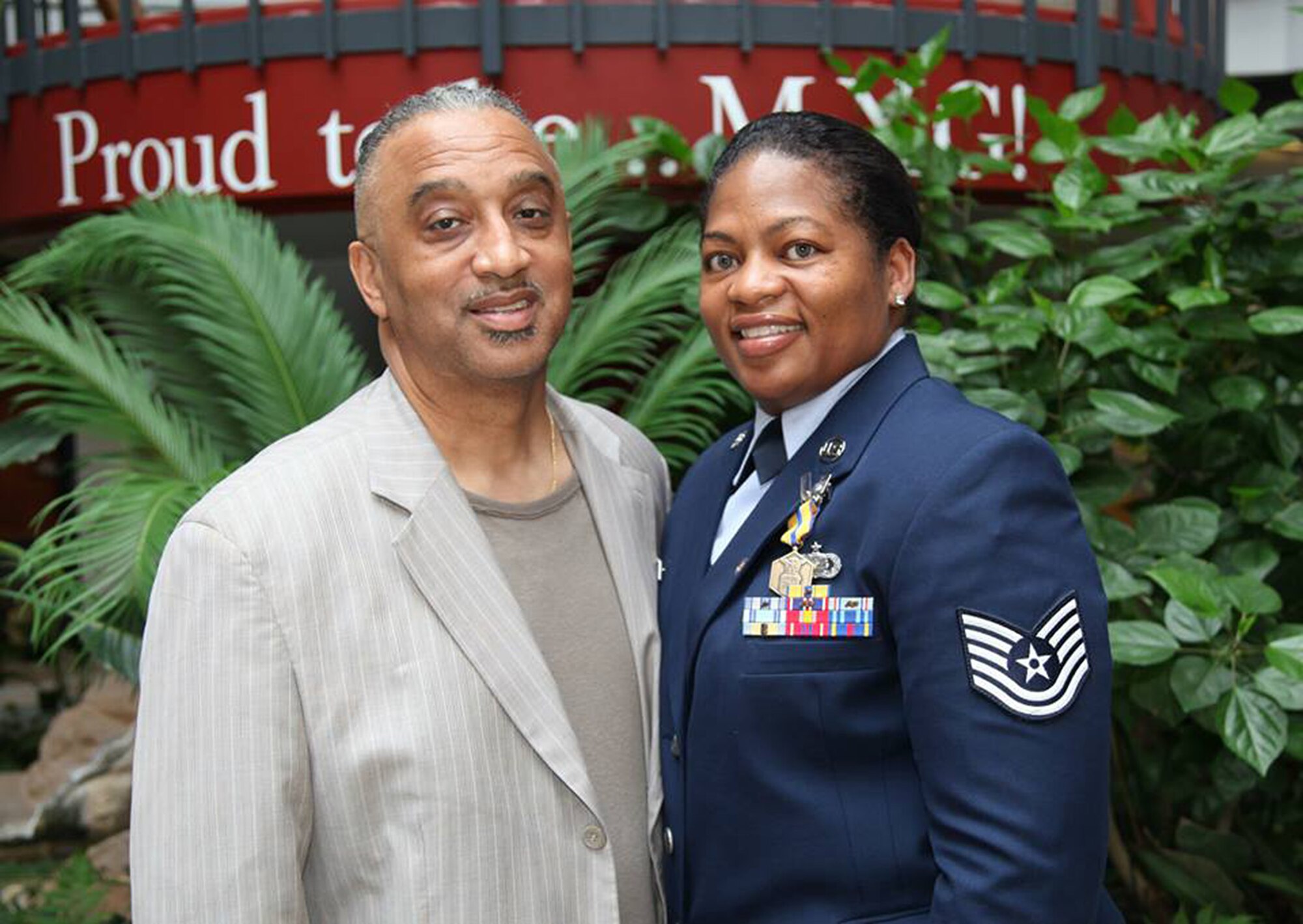 TRAVIS AIR FORCE BASE, Calif. -- Friends and family celebrated the military career of Tech. Sgt. Carmelita L. Nix, 349th Finance Office, at a retirement ceremony May 17, 2014 at Travis Air Force Base, Calif. (U.S. Air Force photo/Lt. Col. Robert Couse-Baker) 