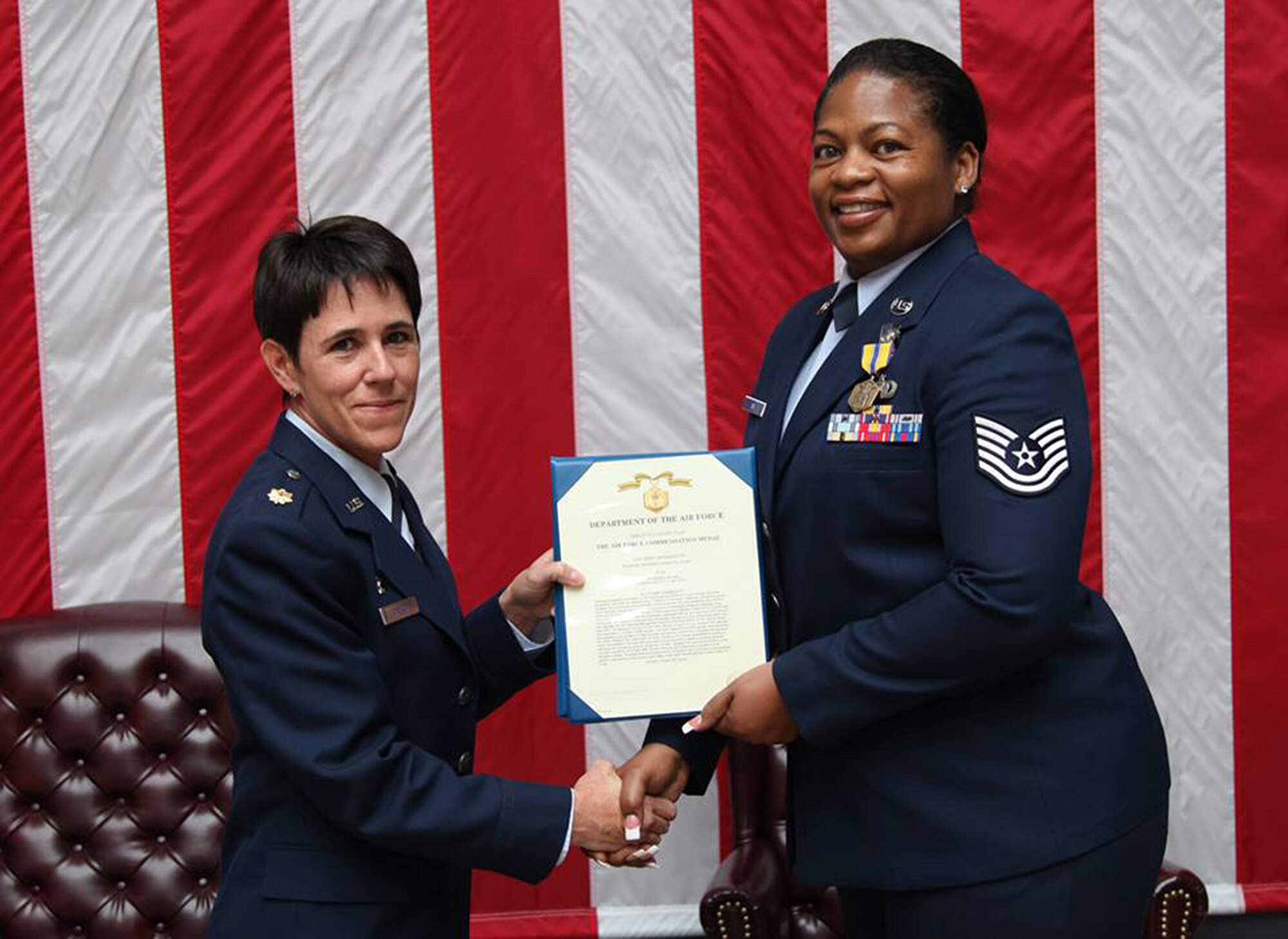 TRAVIS AIR FORCE BASE, Calif. -- Friends and family celebrated the military career of Tech. Sgt. Carmelita L. Nix, 349th Finance Office, at a retirement ceremony May 17, 2014 at Travis Air Force Base, Calif. (U.S. Air Force photo/Lt. Col. Robert Couse-Baker) 