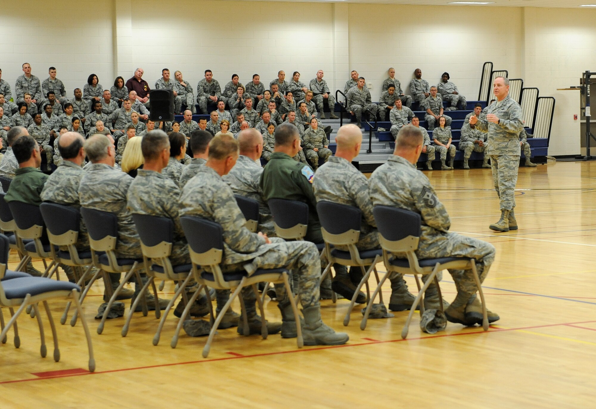 Air Force Chief of Staff Gen. Mark A. Welsh III speaks to Team Buckley May 27, 2014, at the base fitness center on Buckley Air Force Base, Colo. Welsh’s visit to Buckley included mission briefings, Airmen recognition and a chance for the base to meet the Air Force’s top officer. (U.S. Air Force photo by Airman 1st Class Samantha Saulsbury/Released)