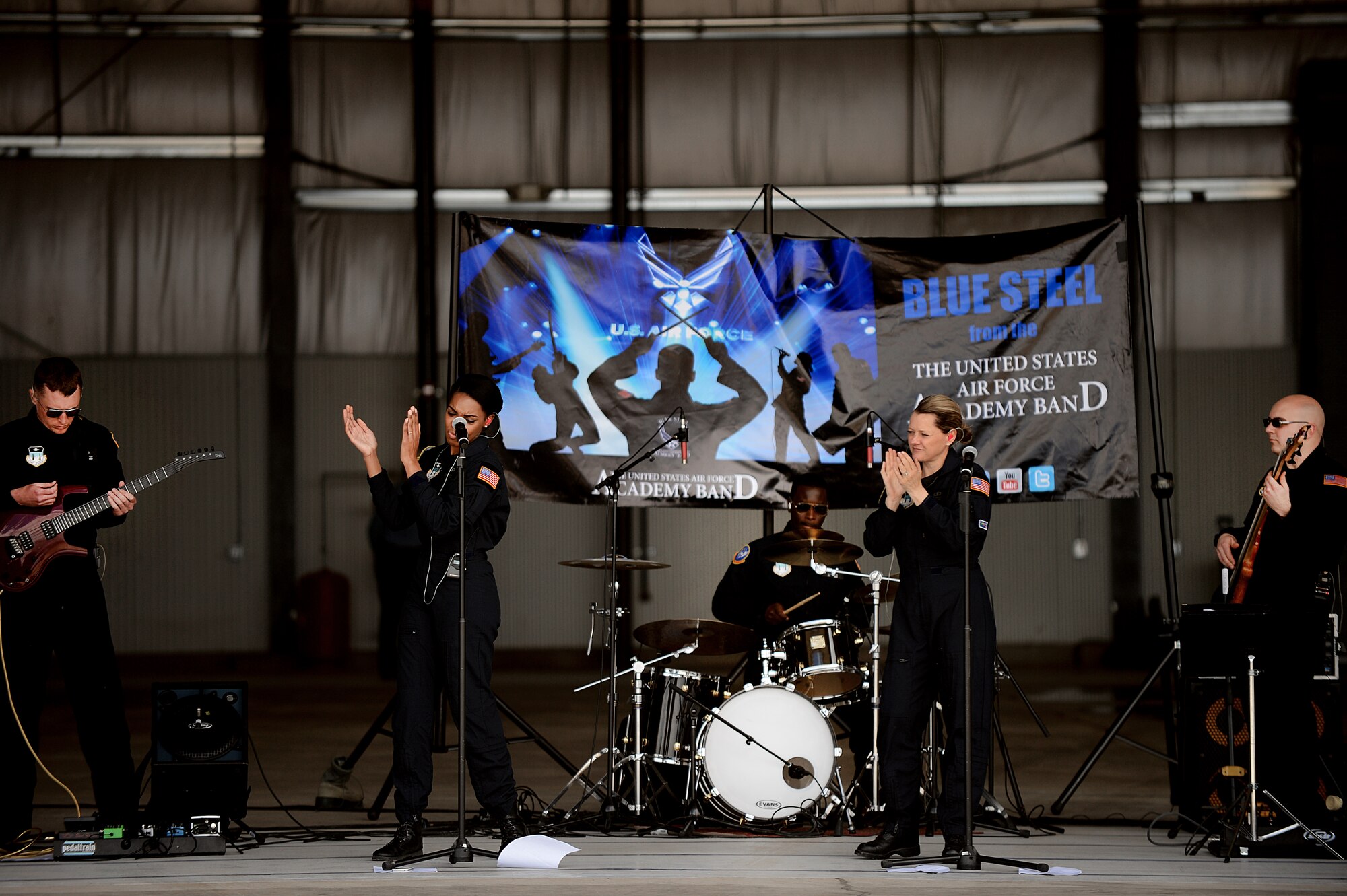 U.S. Air Force Academy Band, Blue Steel, performs during the air show and open house, May 24, 2014 at Cannon Air Force Base, N.M. Thousands travelled from the local area and bordering states to witness aerial demonstrations, view static displays and listen to musical performances at Cannon’s Air Show and Open House. (U.S. Air Force photo/ Staff Sgt. Matthew Plew)