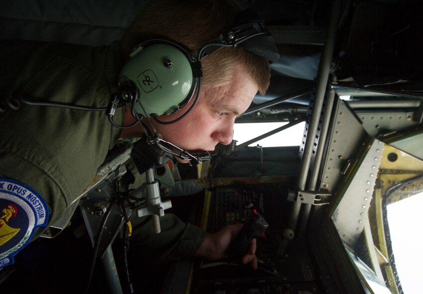 KEFLAVIK, Iceland -- Senior Airman Kyle Cleis, 48th Air Expeditionary Group KC-135 Stratotanker boom operator, offloads fuel to an F-15C Eagle during a training mission near Keflavik International Airport May 28, 2014. The Aircraft are deployed with the 48th Air Expeditionary Group for the NATO mission of Icelandic Air Policing. (U.S. Air Force photo/Tech. Sgt. Benjamin Wilson)(Released)