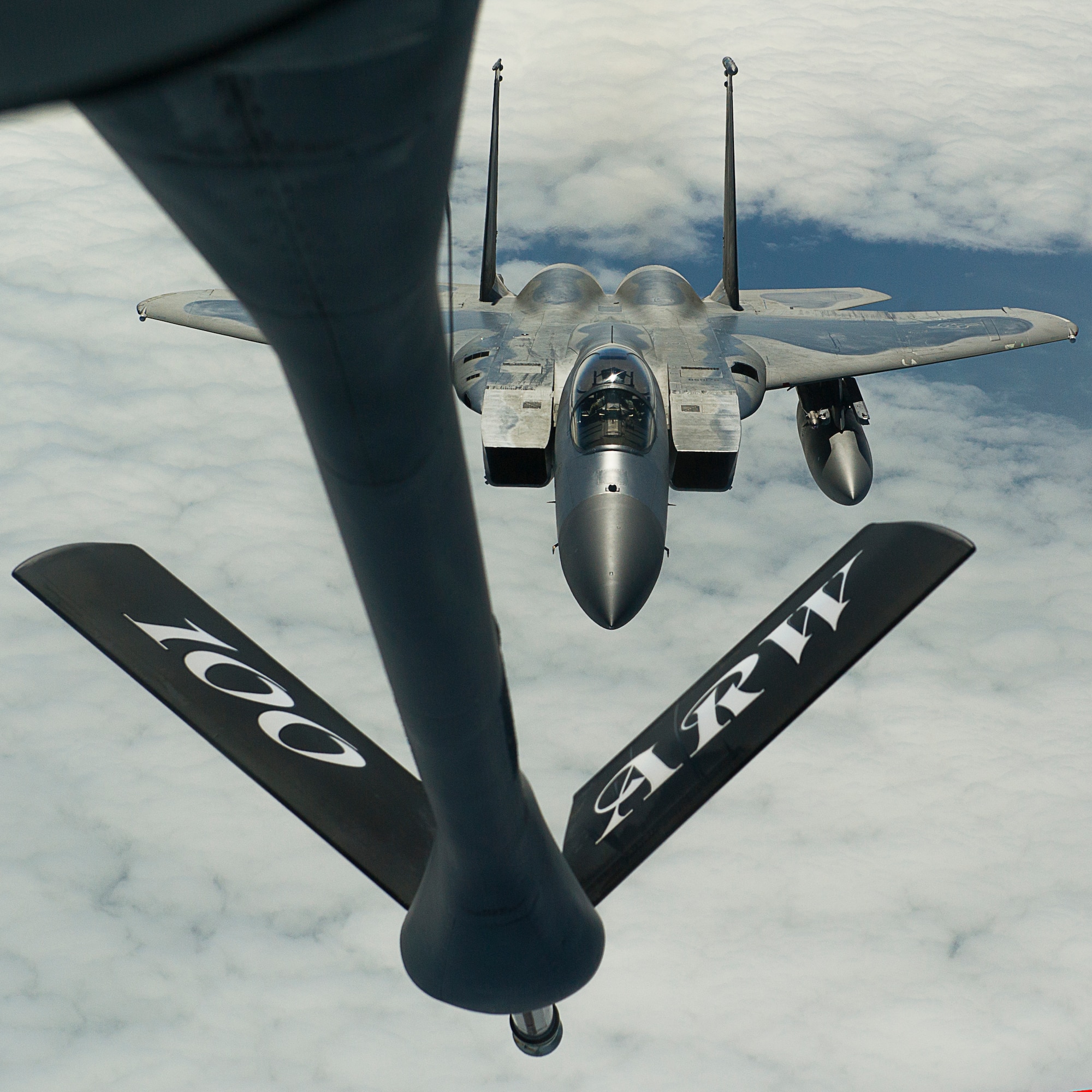 KEFLAVIK, Iceland -- A KC-135 Stratotanker deployed from Royal Air Force Mildenhall, England, prepares to refuel an F-15C Eagle deployed from RAF Lakenheath, England, during a training mission near Keflavik International Airport May 28, 2014. The Aircraft are deployed with the 48th Air Expeditionary Group for the NATO mission of Icelandic Air Policing. (U.S. Air Force photo/Tech. Sgt. Benjamin Wilson)(Released)