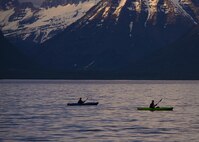 Two kayakers explore Lake McDonald near West Glacier National Park in Apgar Village, Mont. At 10 miles long and 500 feet deep as a result of glacial carving, Lake McDonald is the largest lake in the park and a central location for West Glacier and includes biking and hike trails ranging in easy to strenuous difficulty. (U.S. Air Force photo/Senior Airman Katrina Heikkinen)