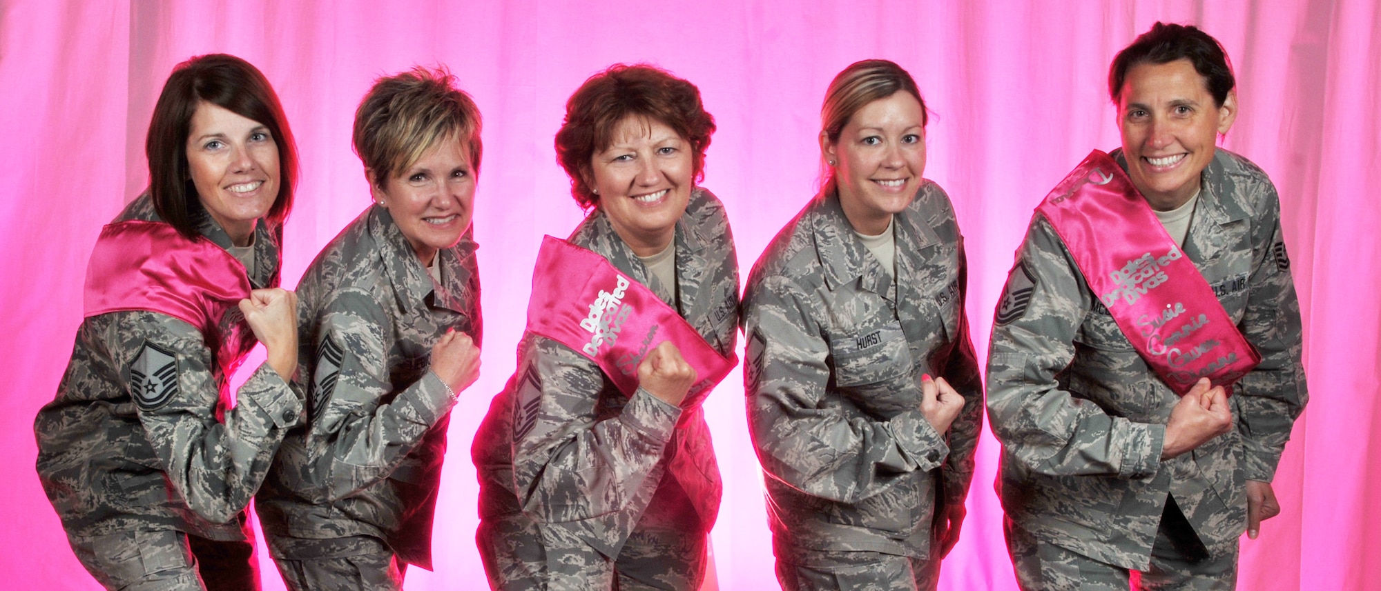 Five 180th Fighter Wing Airmen pose for Dale’s Dedicated Divas team photo.  Senior Master Sgt. Dale Przyojski (center) is a two-time breast cancer survivor.  Dale’s Dedicated Divas raised over $18,000 dollars for underinsured victims of breast cancer through the Avon Walk for Breast Cancer.  (Ohio Air National Guard photo by Staff Sgt. Amber Williams/Released)