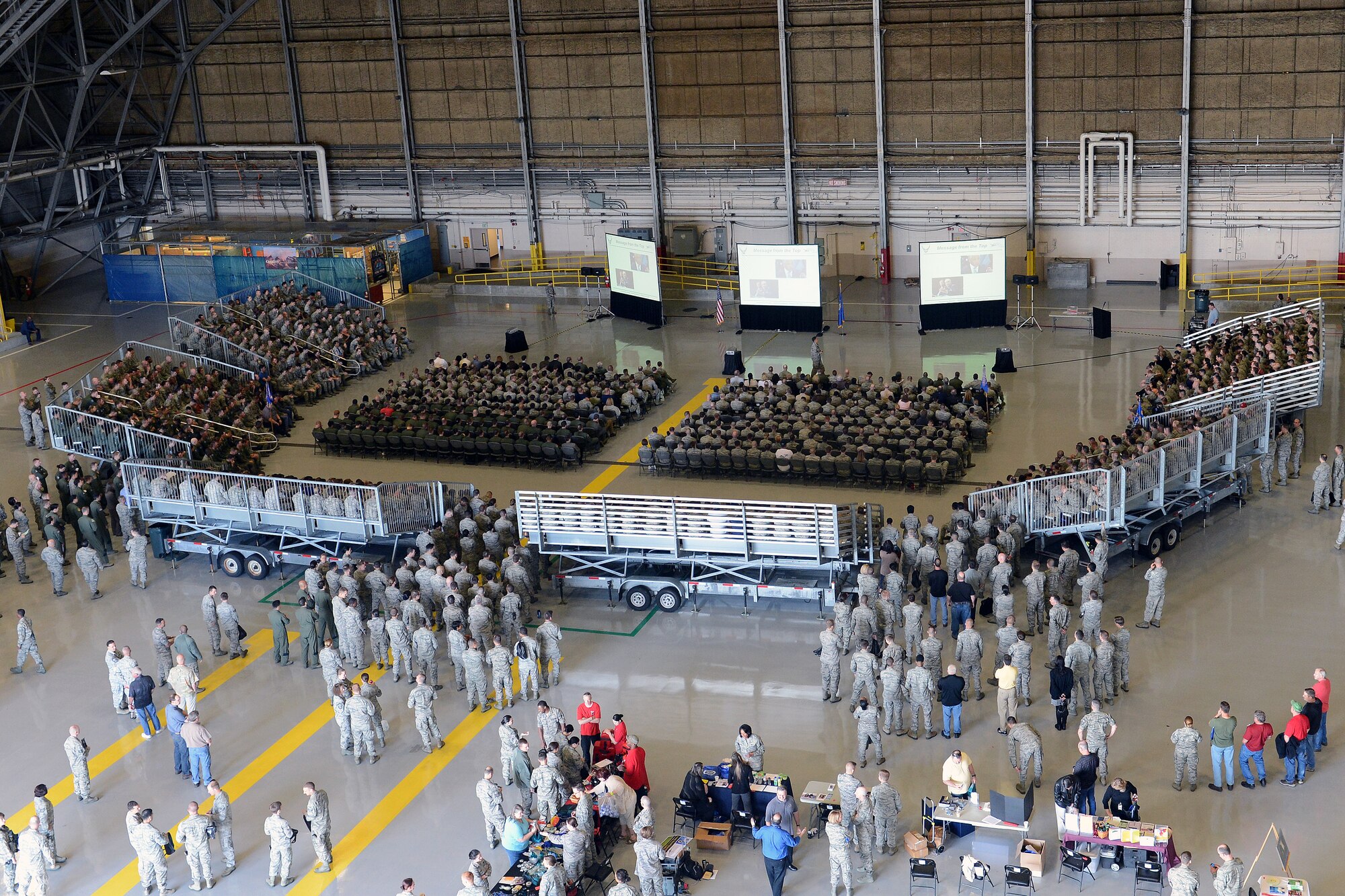 Airmen of Team McChord listen to Col. David Kumashiro, 62nd Airlift Wing commander, during the Sexual Assault Prevention and Response down day May 22, 2014, at Joint Base Lewis-McChord, Wash. The SAPR down day is a Department of Defense initiative to reiterate zero tolerance of sexual assault and focus on instilling a climate of dignity and respect. (U.S. Air Force photo/Airman 1st Class Jacob Jimenez)   