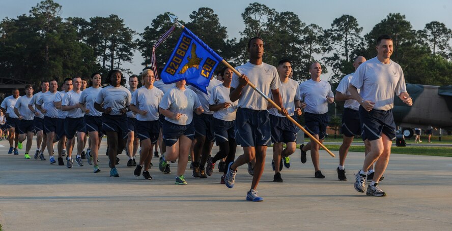 Airmen from the 820th Base Defense Group began a 2.3 mile run for Comprehensive Airmen Fitness (CAF) day at Moody Air Force Base, Ga., May 22, 2014. The run symbolized the physical pillar, just one of the four pillars that make up CAF day. (U.S. Air Force photo by Airman 1st Class A/lexis Millican/Released)