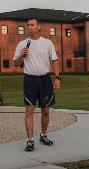 U.S. Air Force Col. Chad Franks, 23d Wing commander, talks about what Comprehensive Airmen Fitness (CAF) day is about at Moody Air Force Base, Ga., May 22, 2014. CAF day is made up of four pillars; physical, mental, social and spiritual which helps to ensure the safety of Airmen. (U.S. Air Force photo by Airman 1st Class Alexis Millican/Released)
