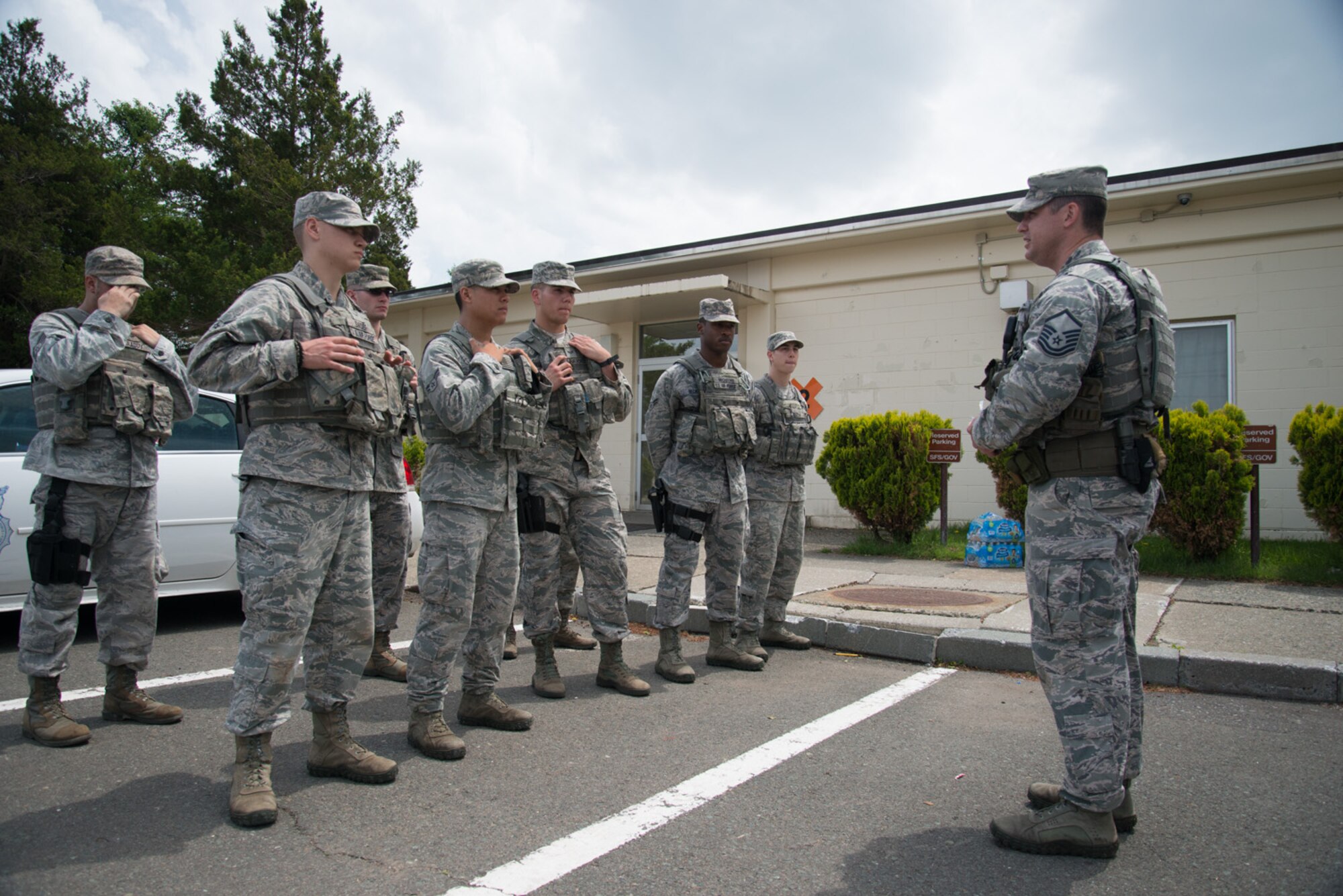 U.S. Air Force Master Sgt. Roy Eberle, 35th Security Forces Squadron, addresses members of the squadron’s newest Special Reaction Team at Misawa Air Base, Japan, May 27, 2014. Eight Airmen tried out and made the SRT, which specializes in handling high-risk situations and emergencies. (U.S. Air Force photo/Staff Sgt. Jared Elliott)
