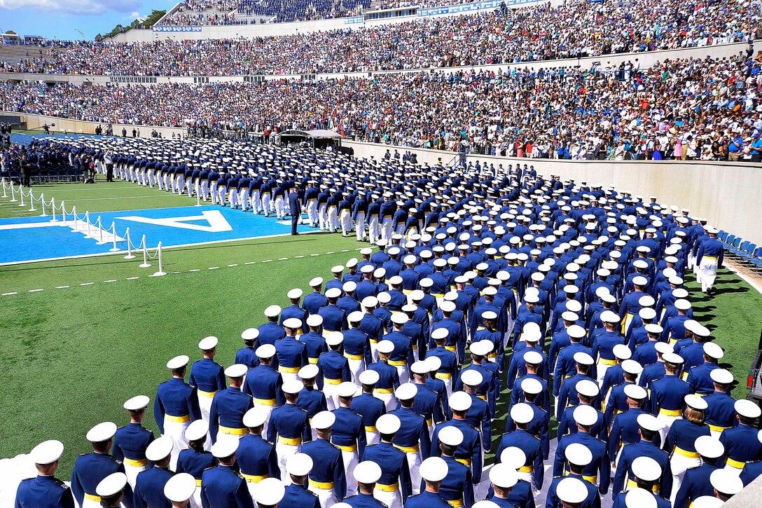 The U.S. Air Force Academy's Class of 2014 marches into Falcon Stadium for graduation in Colorado Springs, Colo., May 28, 2014. A total of 995 cadets received their commissions during the ceremony.