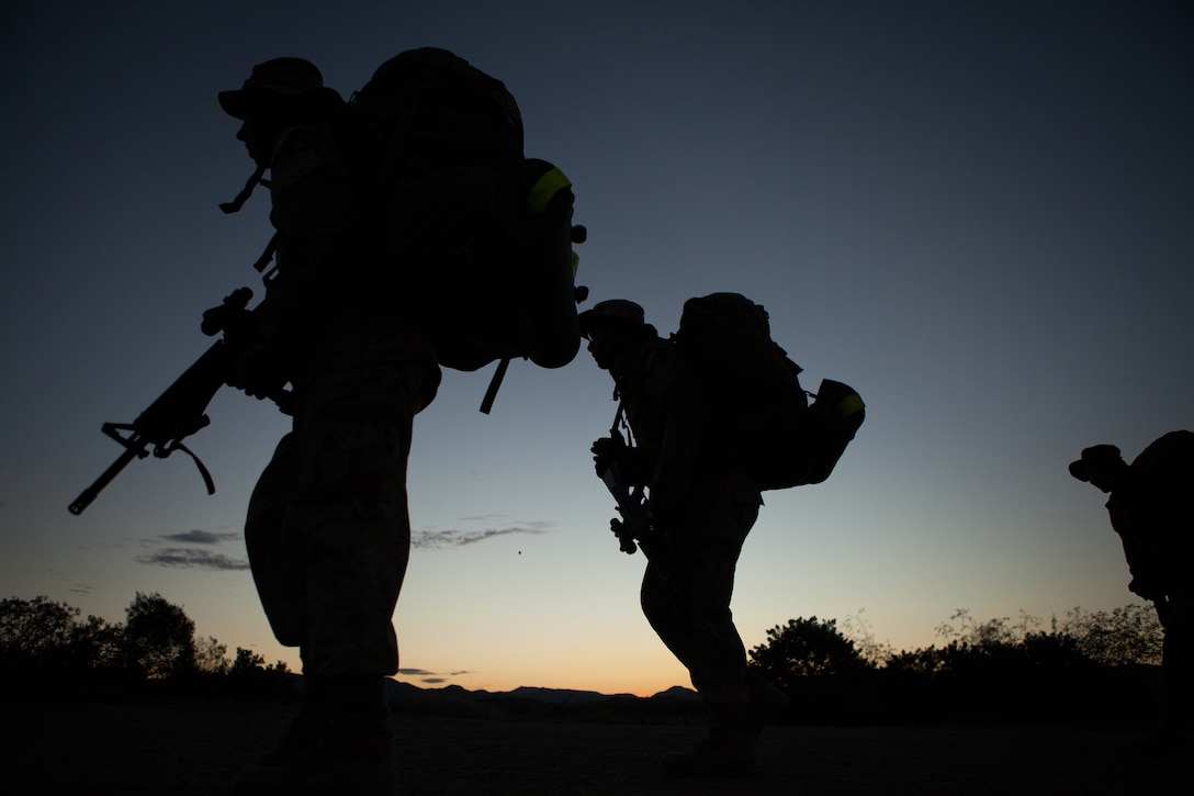 Marines conduct an early morning five kilometer hike to the grenade range as part of Marine Combat training on Marine Corps Base Camp Pendleton, Ca., Aug. 28, 2012. The Marines are constantly being pushed to and beyond their limits so they are ready physically and mentally for combat.  
