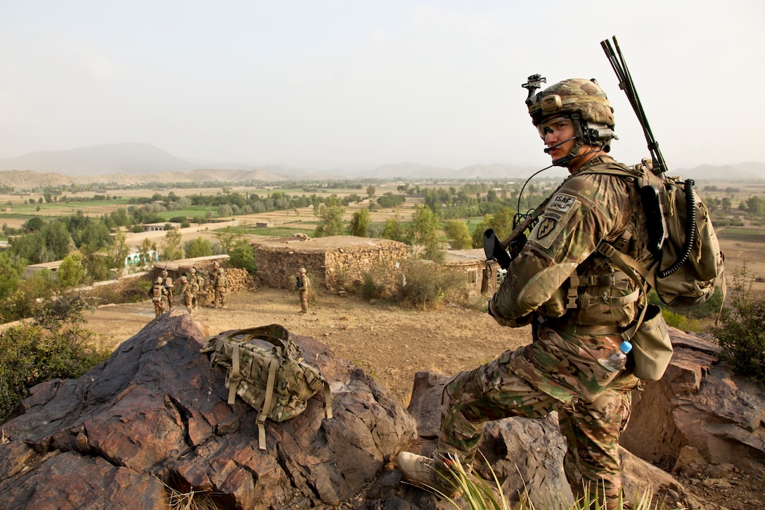 U.S. Army Spc. Jordan Duffy provides security from a hilltop in Black Rock during a patrol in Afghanistan's Khowst province, July 31, 2012. Duffy, whose unit conducted the patrol to investigate an attack to Combat Outpost Bak, is a forward observer assigned to the 25th Infantry Division's Company A, 1st Battalion, 501st Infantry Regiment, 4th Brigade Combat Team. 
