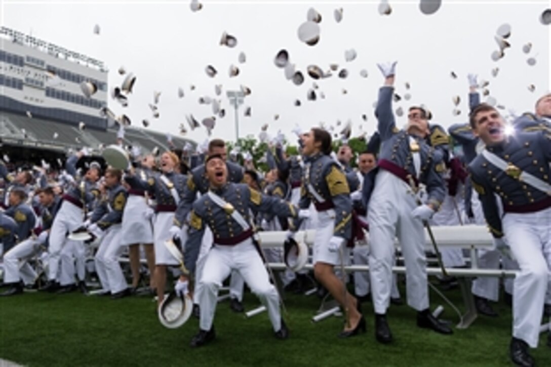Newly commissioned second lieutenants participate in the traditional hat toss at the end of the 2014 commencement ceremony at the U.S. Military Academy at West Point, N.Y., May 28, 2014. 